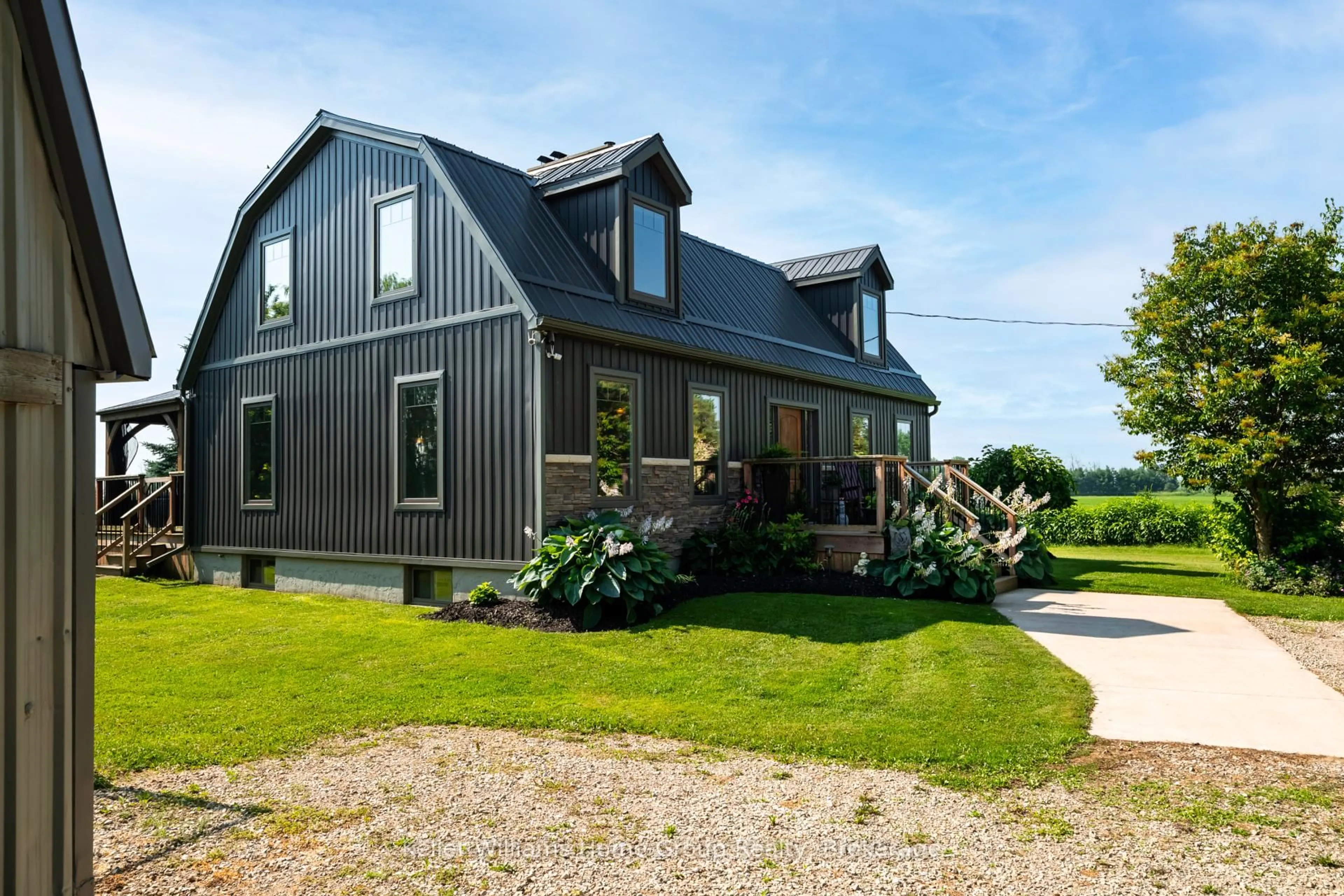 Home with vinyl exterior material, street for 8877 Sideroad 3, Wellington North Ontario N0G 2E0