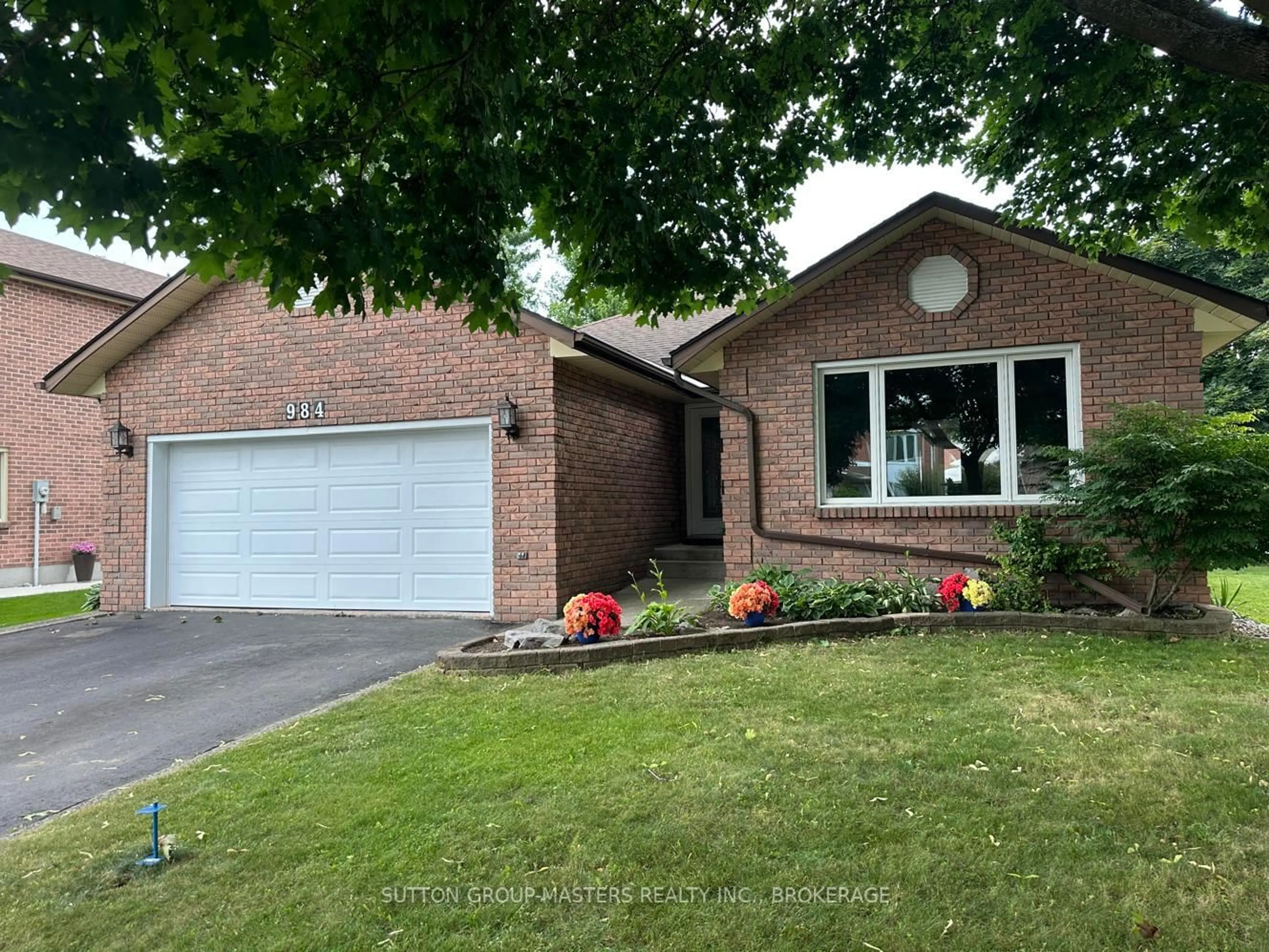 Home with brick exterior material, street for 984 Ambleside Cres, Kingston Ontario K7P 2B7