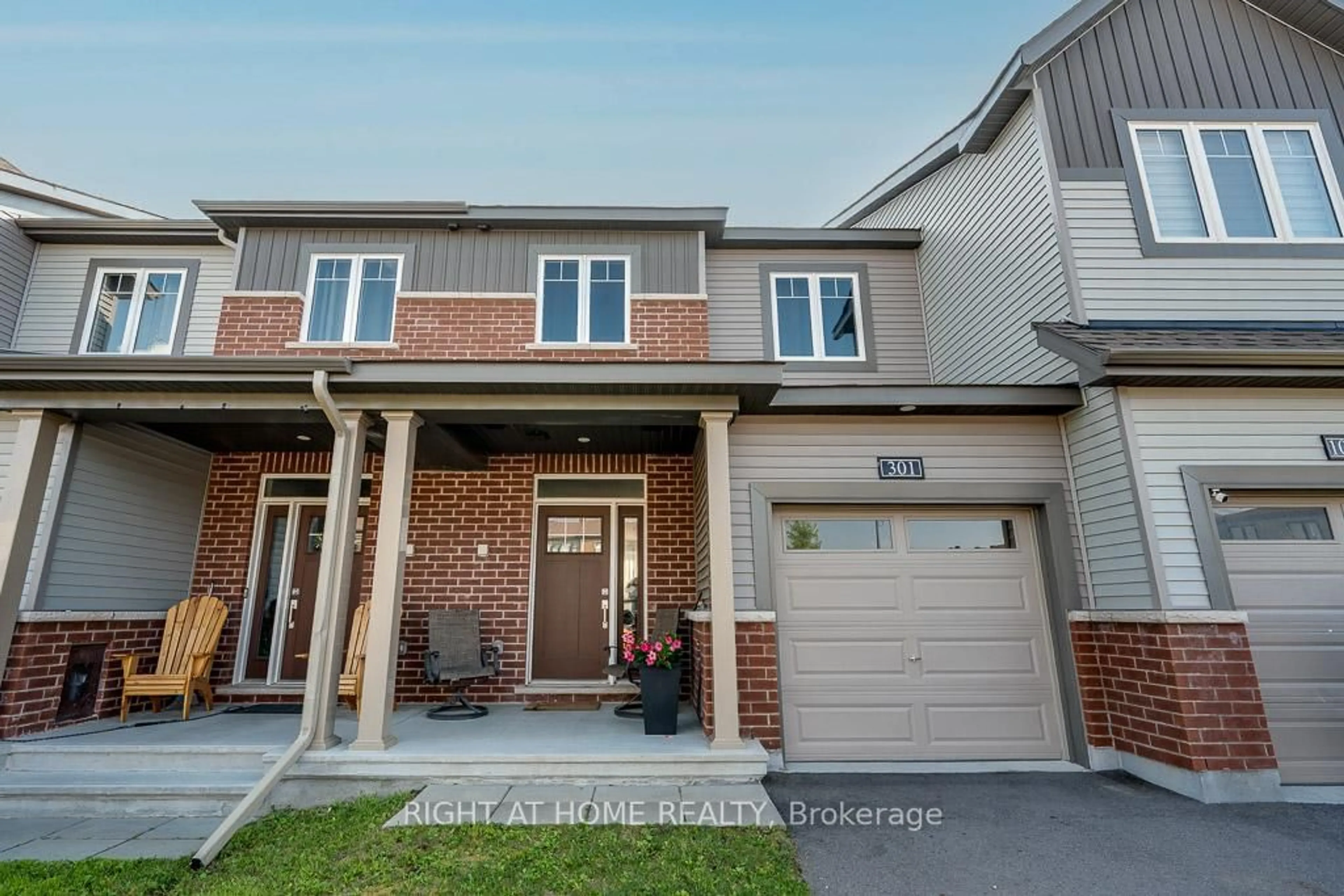 Home with brick exterior material, street for 301 Drumlish Lane, Ottawa Ontario K2J 6Y1