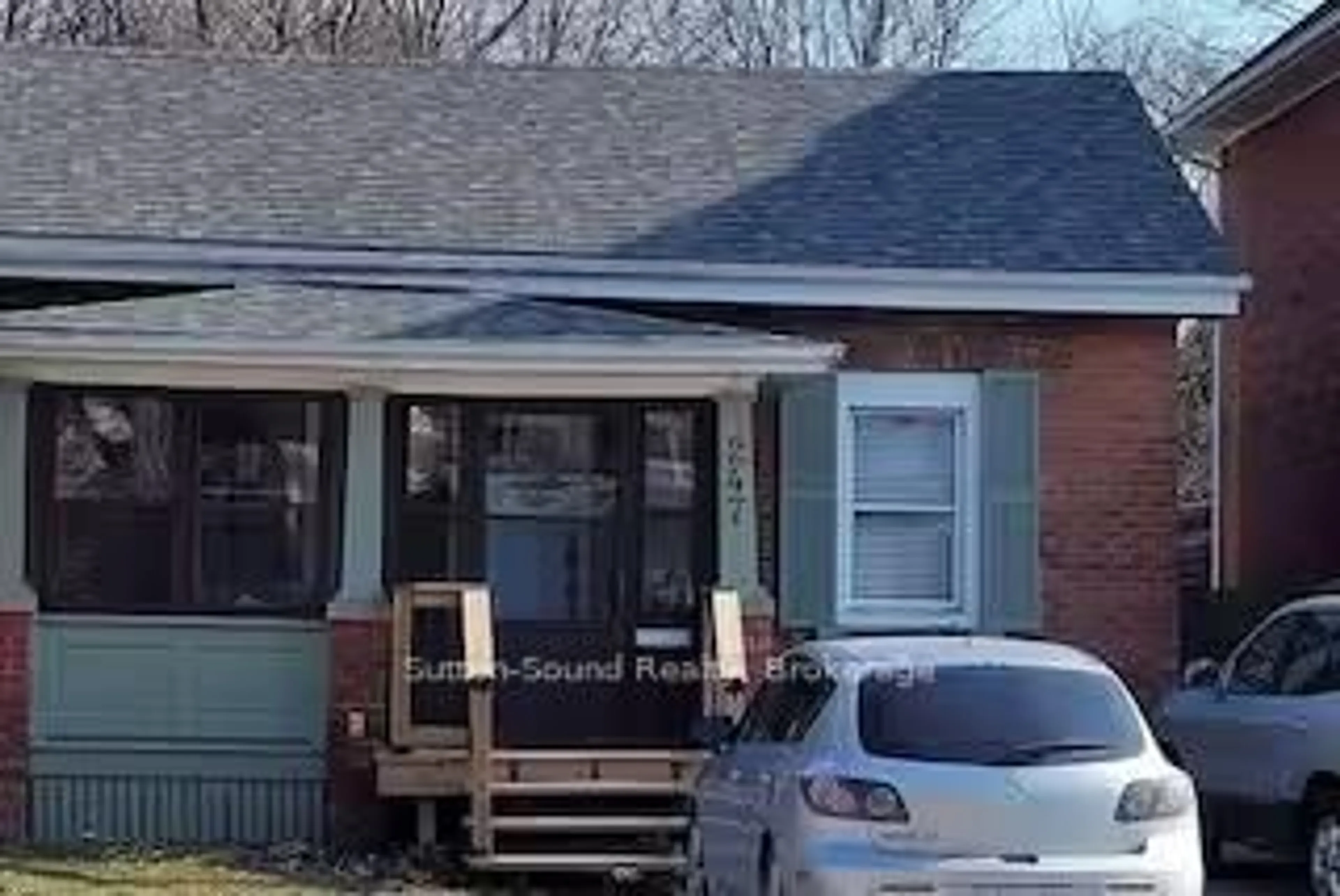 Home with brick exterior material, street for 247 6th St, Owen Sound Ontario N4K 1E8