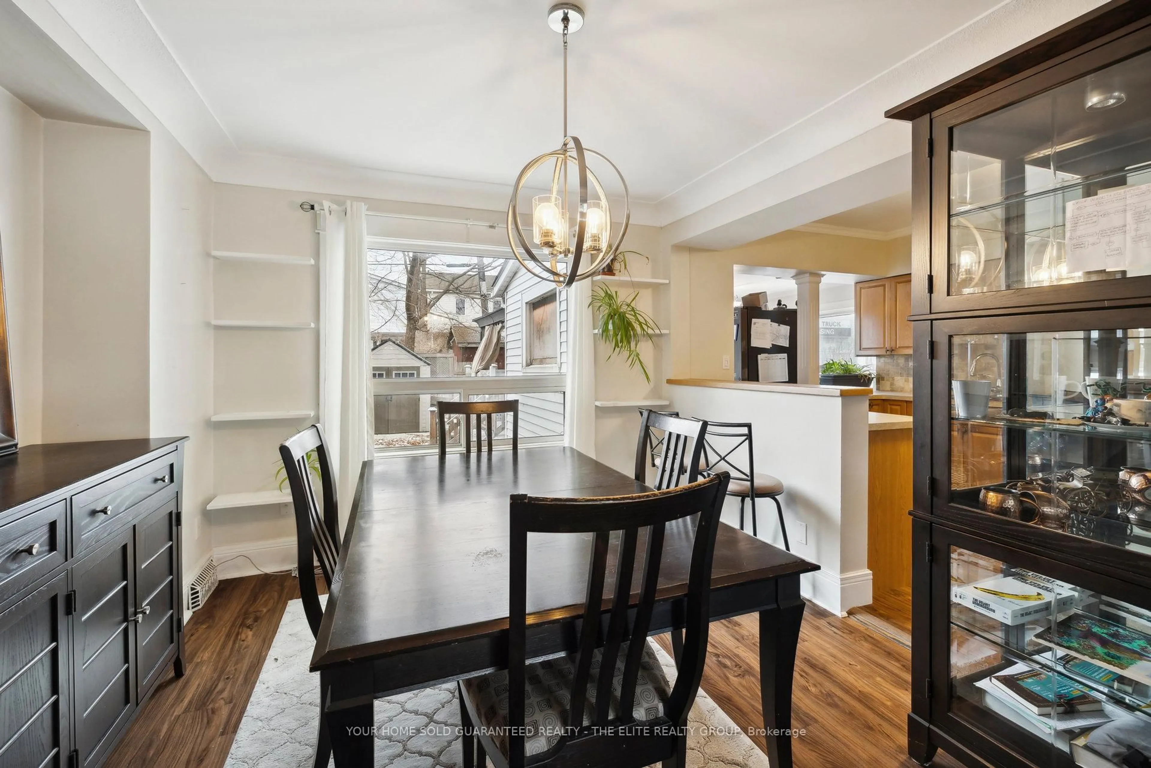 Dining room, wood/laminate floor for 167 Balsam Ave, Hamilton Ontario L8L 6Y4