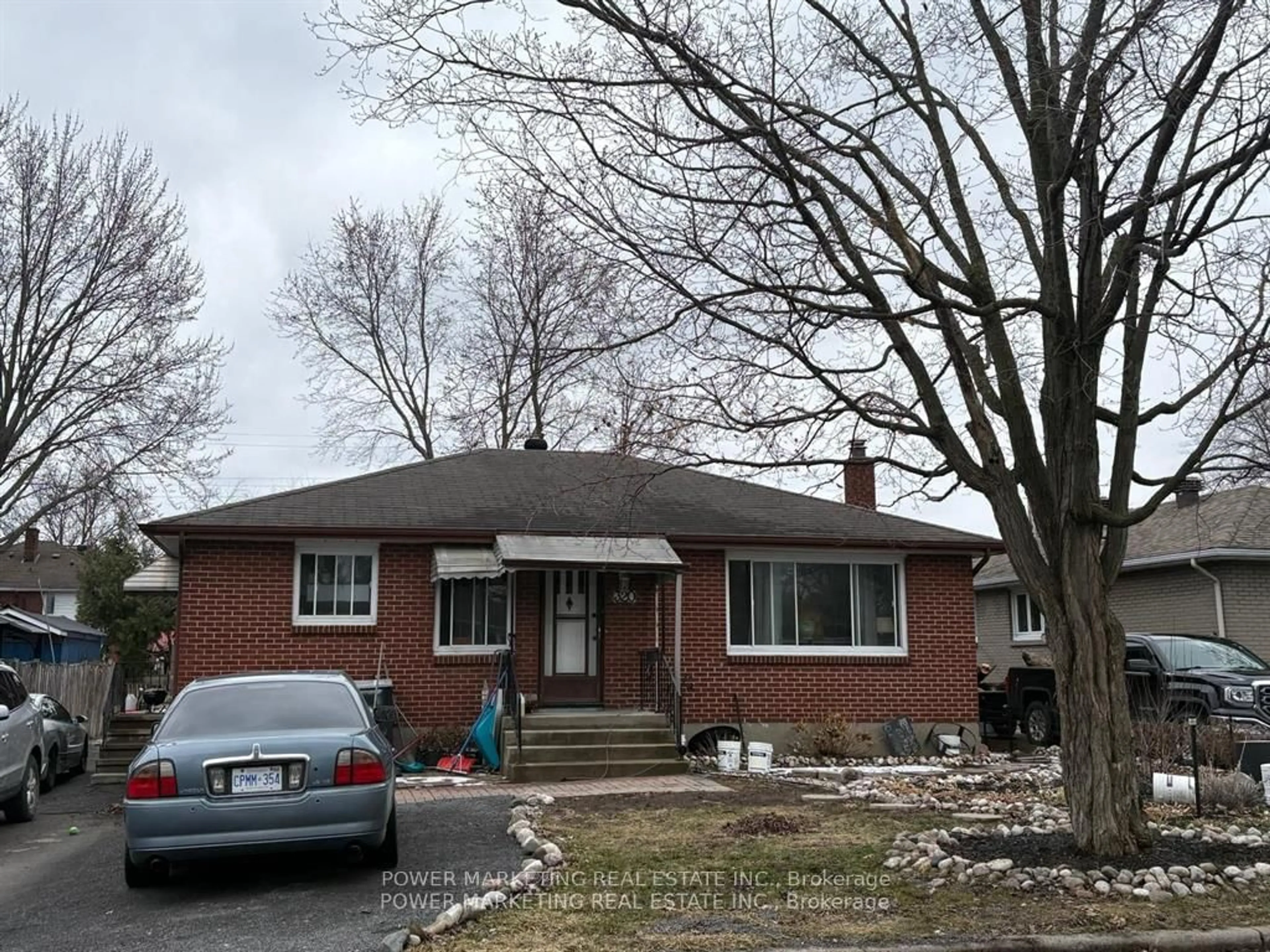 Home with brick exterior material, street for 320 Fullerton Ave, Ottawa Ontario K1K 1K3