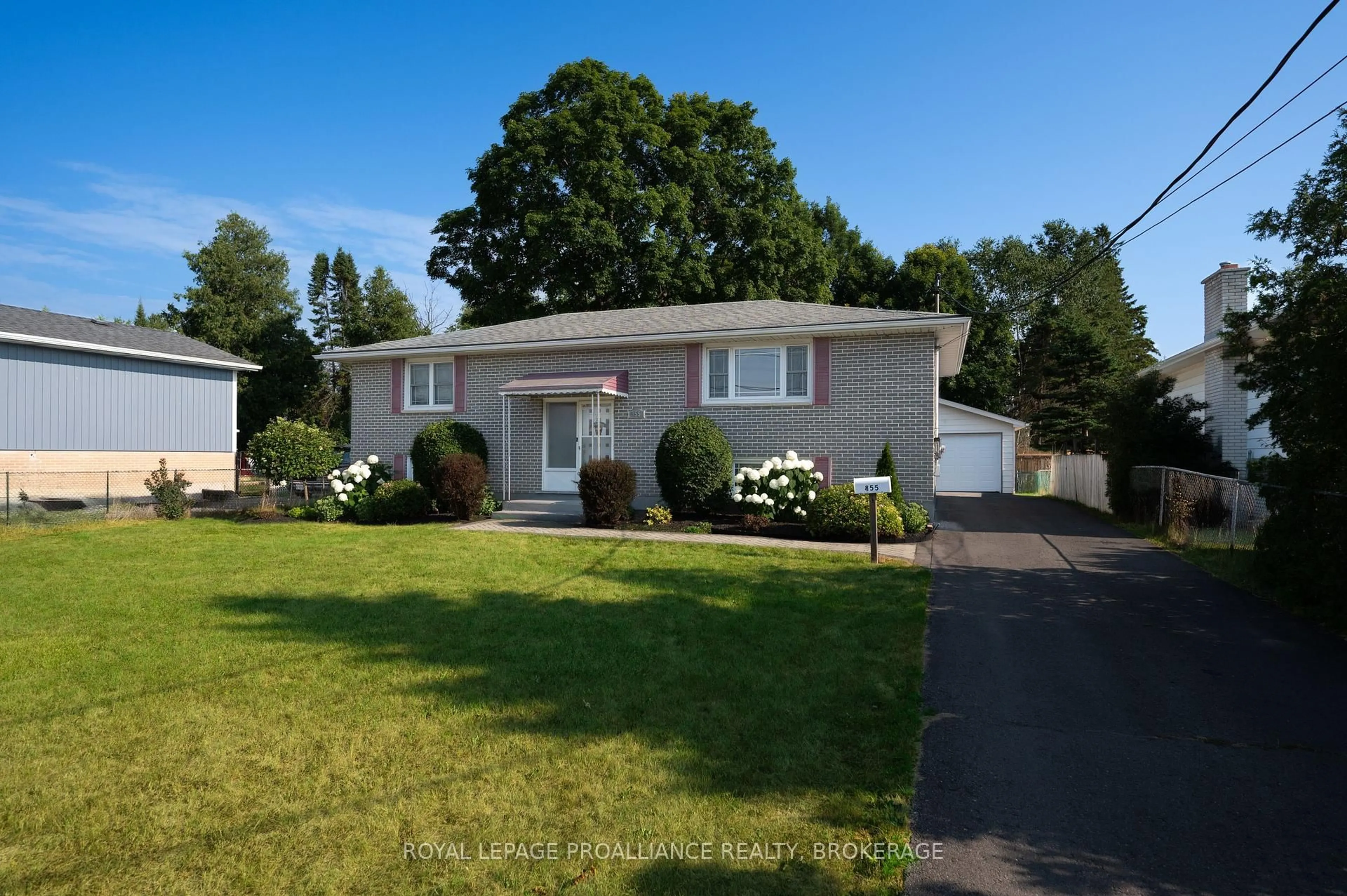 Home with vinyl exterior material, street for 855 Woodbine Rd, Kingston Ontario K7P 2X3