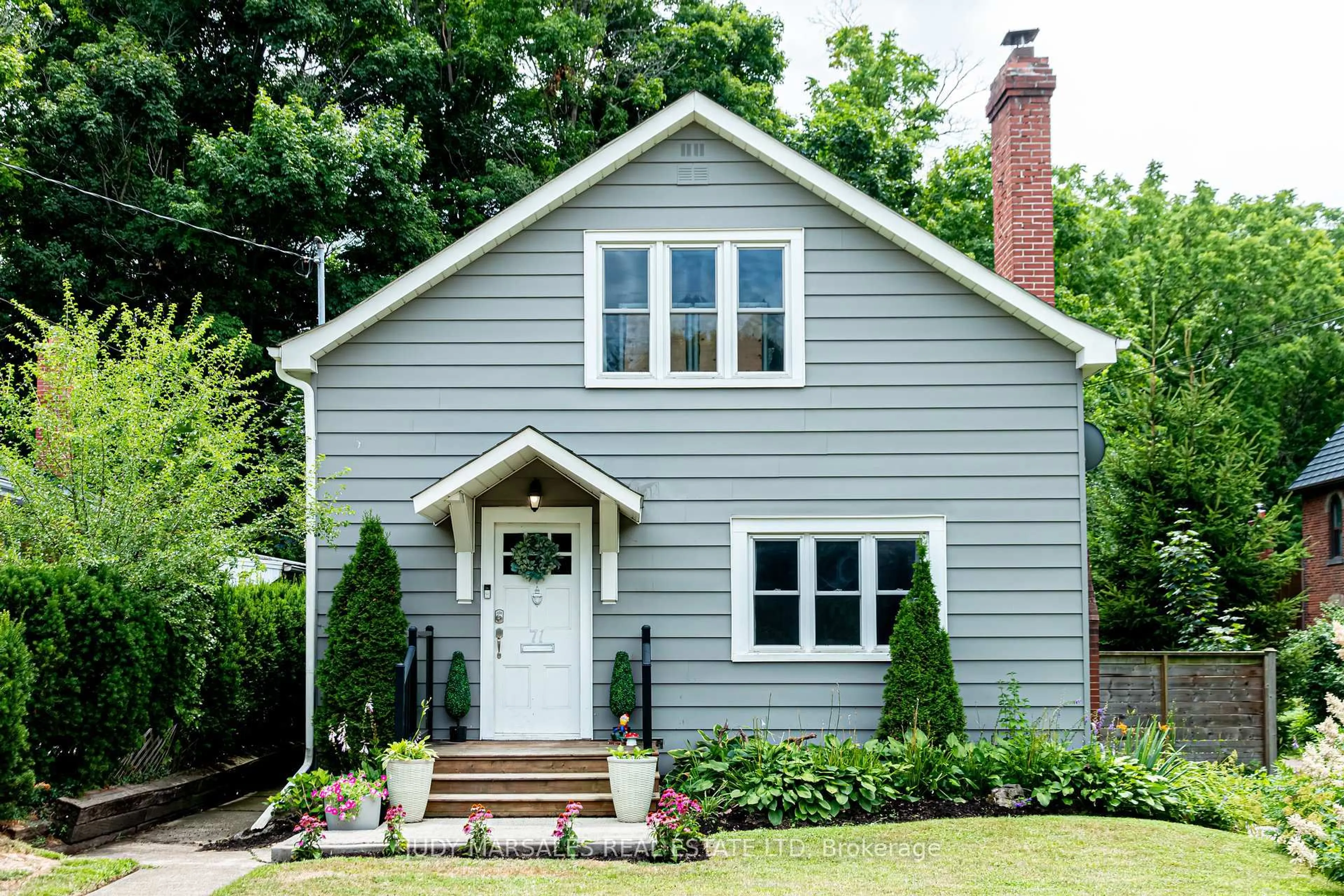 Home with vinyl exterior material, street for 71 Creighton Rd, Hamilton Ontario L9H 6E3