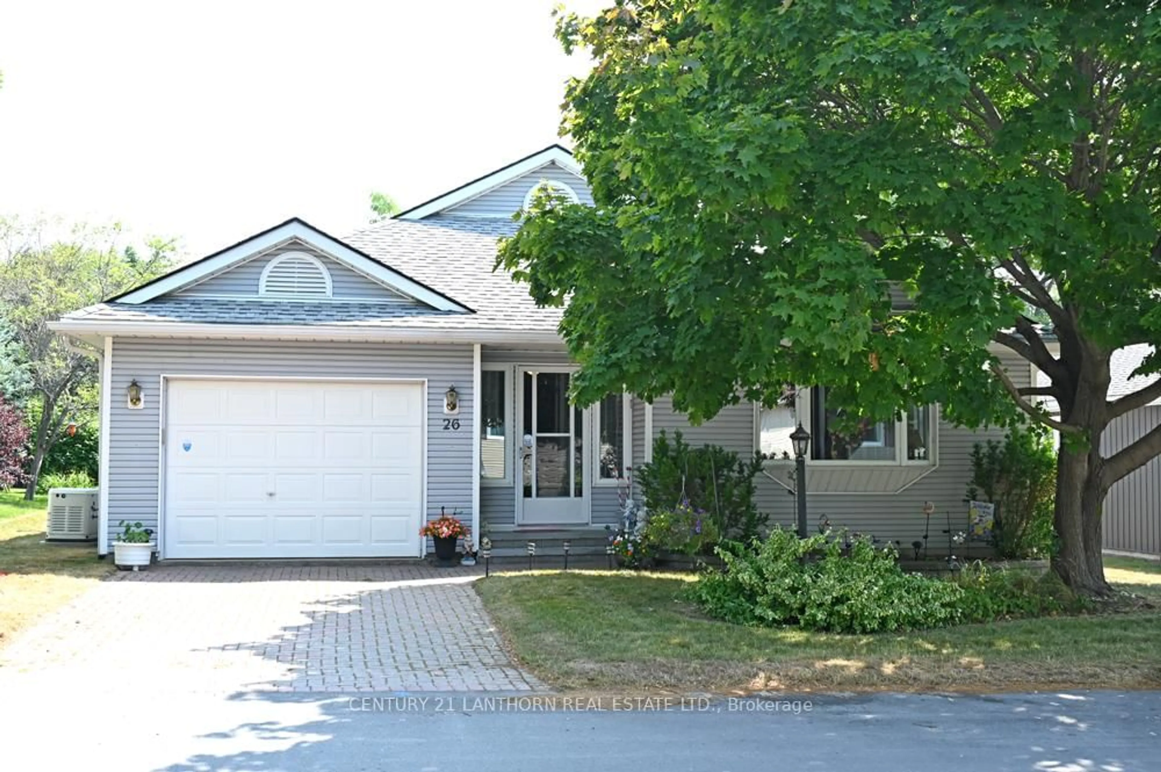 Home with vinyl exterior material, street for 26 Heritage Dr, Prince Edward County Ontario K0K 3L0