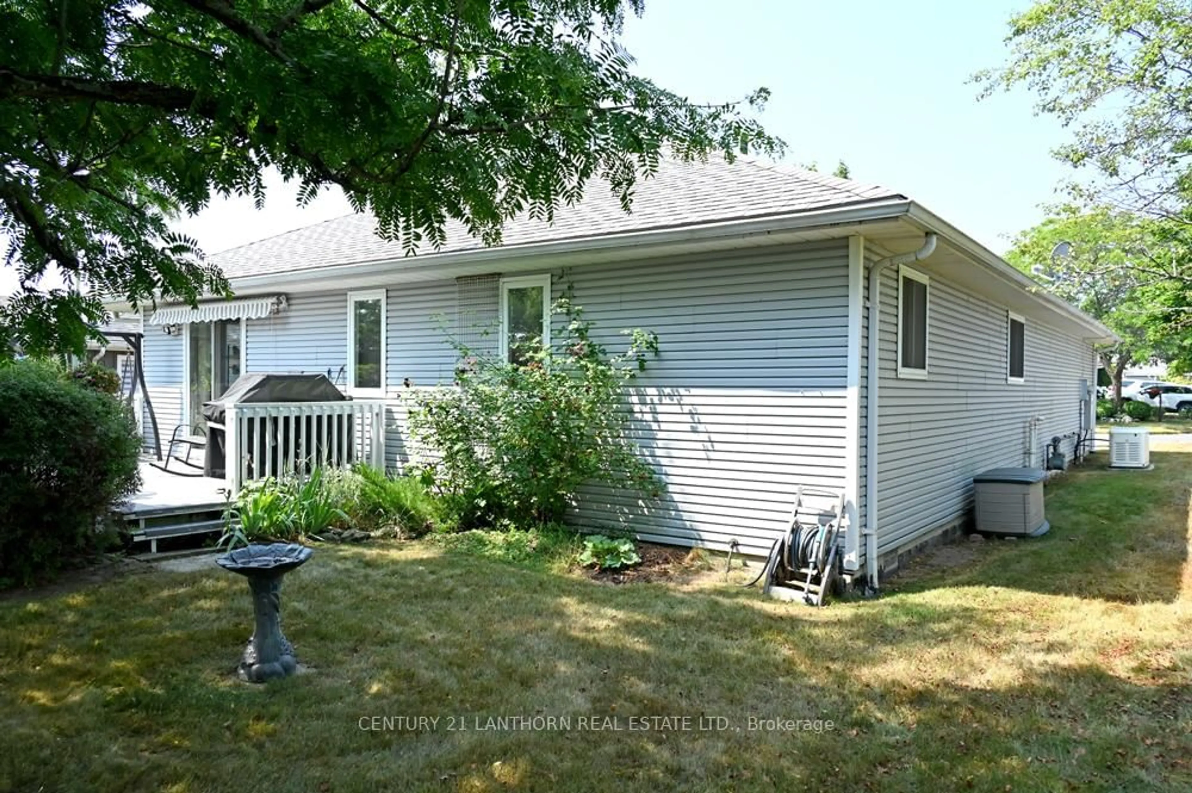 Home with vinyl exterior material, street for 26 Heritage Dr, Prince Edward County Ontario K0K 3L0