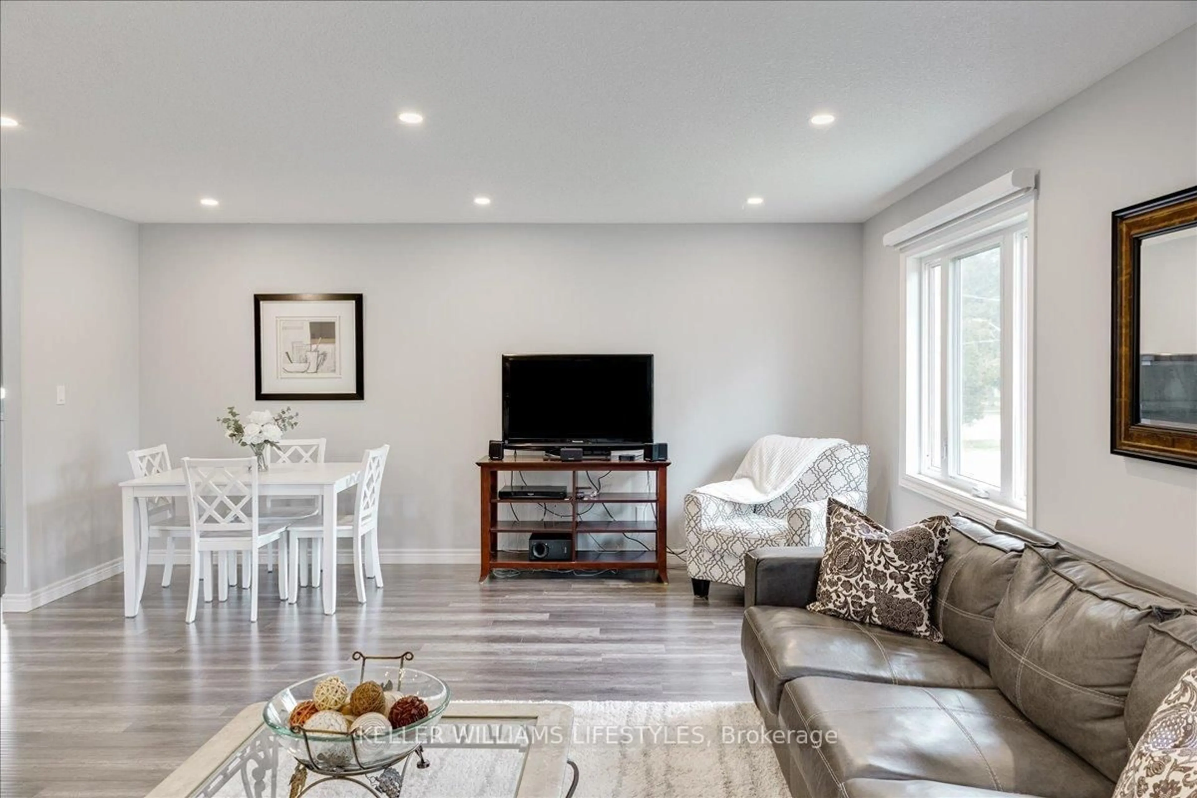 Living room with furniture, wood/laminate floor for 229 Walnut St, Chatham-Kent Ontario N0P 1C0