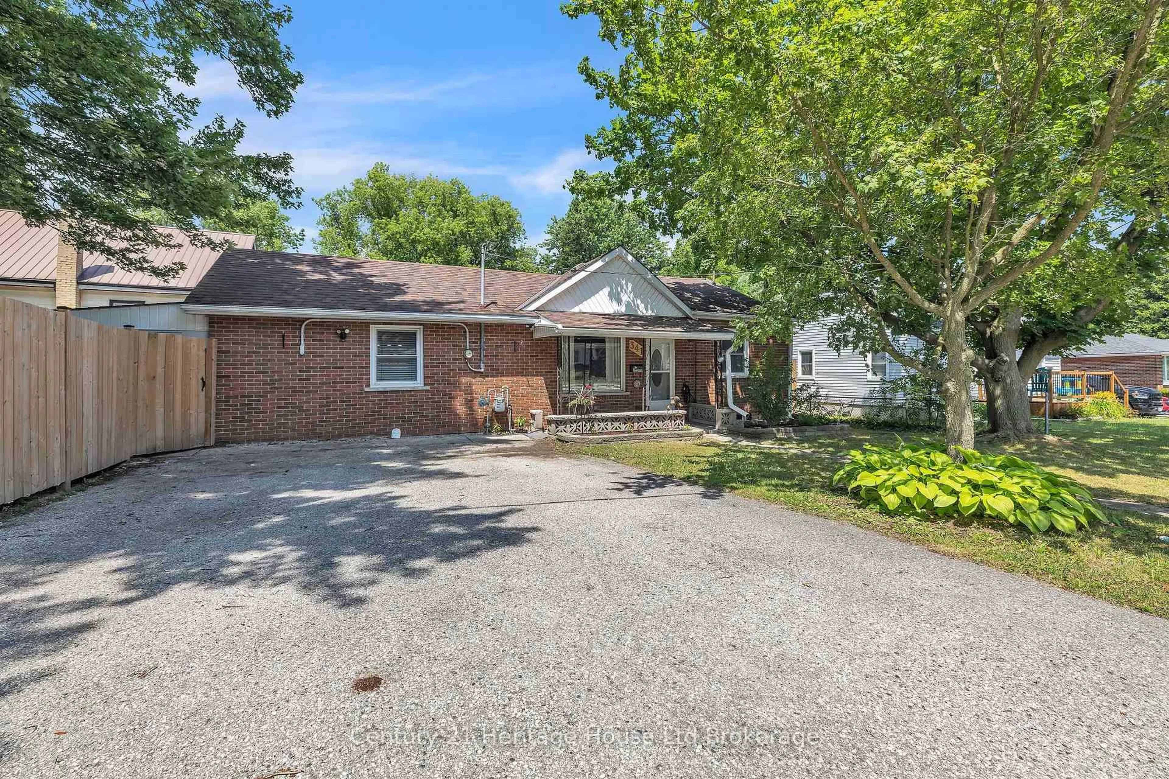 Home with brick exterior material, street for 341 Hay St, Woodstock Ontario N4S 2C2