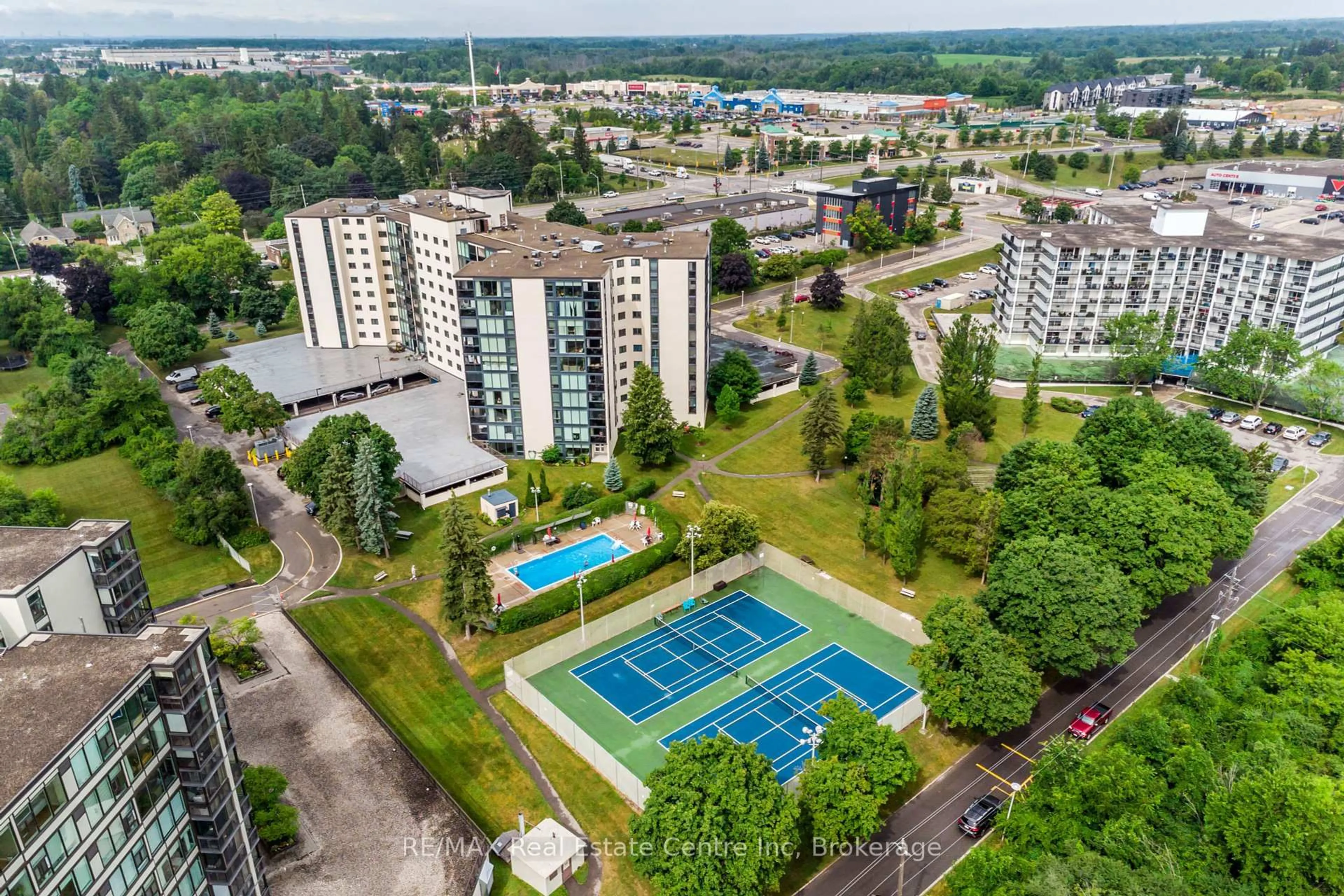 A pic from outside/outdoor area/front of a property/back of a property/a pic from drone, city buildings view from balcony for 19 Woodlawn Rd #214, Guelph Ontario N1H 1G6