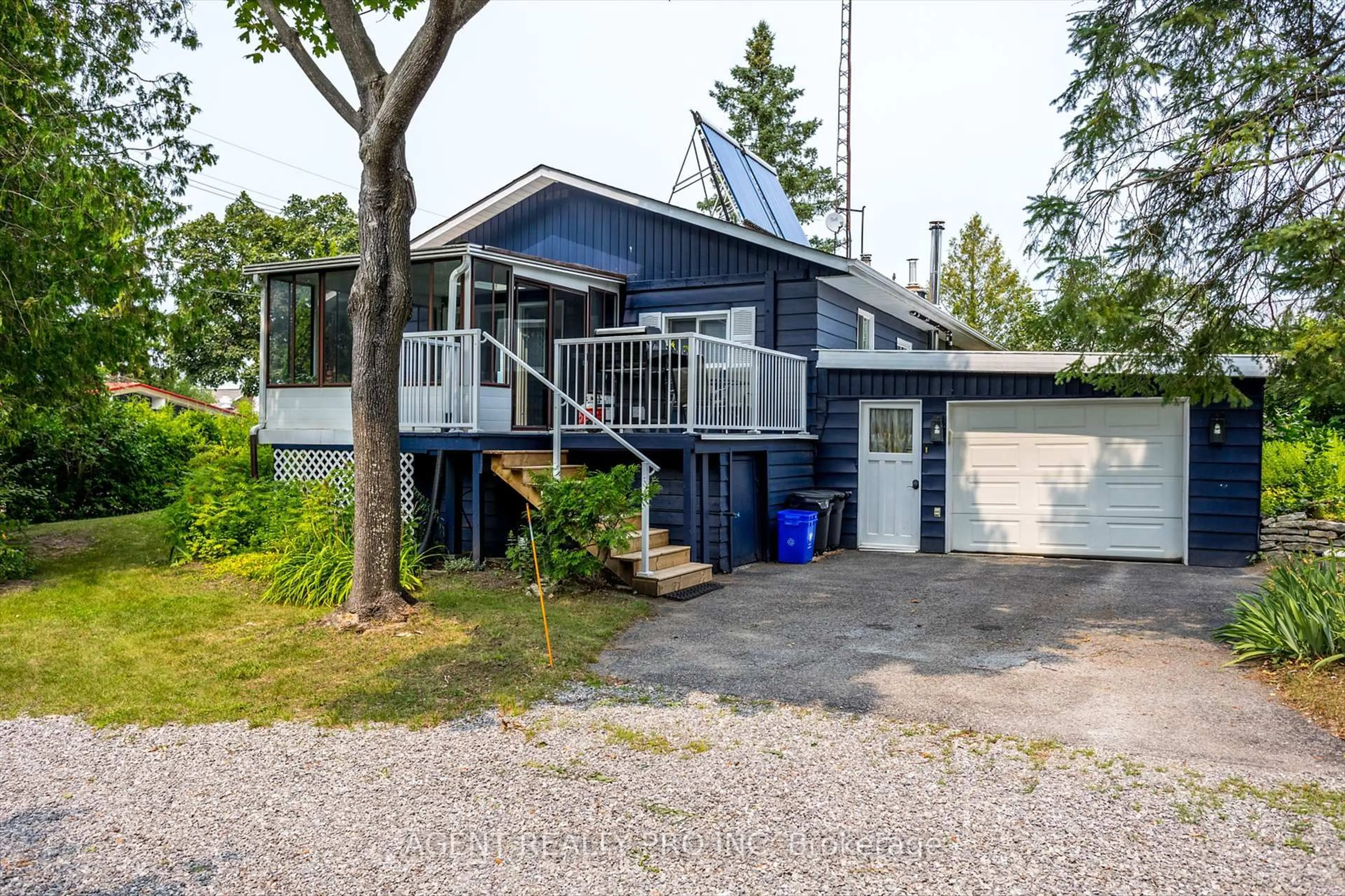 Home with vinyl exterior material, street for 21 Oriole Rd, Kawartha Lakes Ontario K0M 1N0