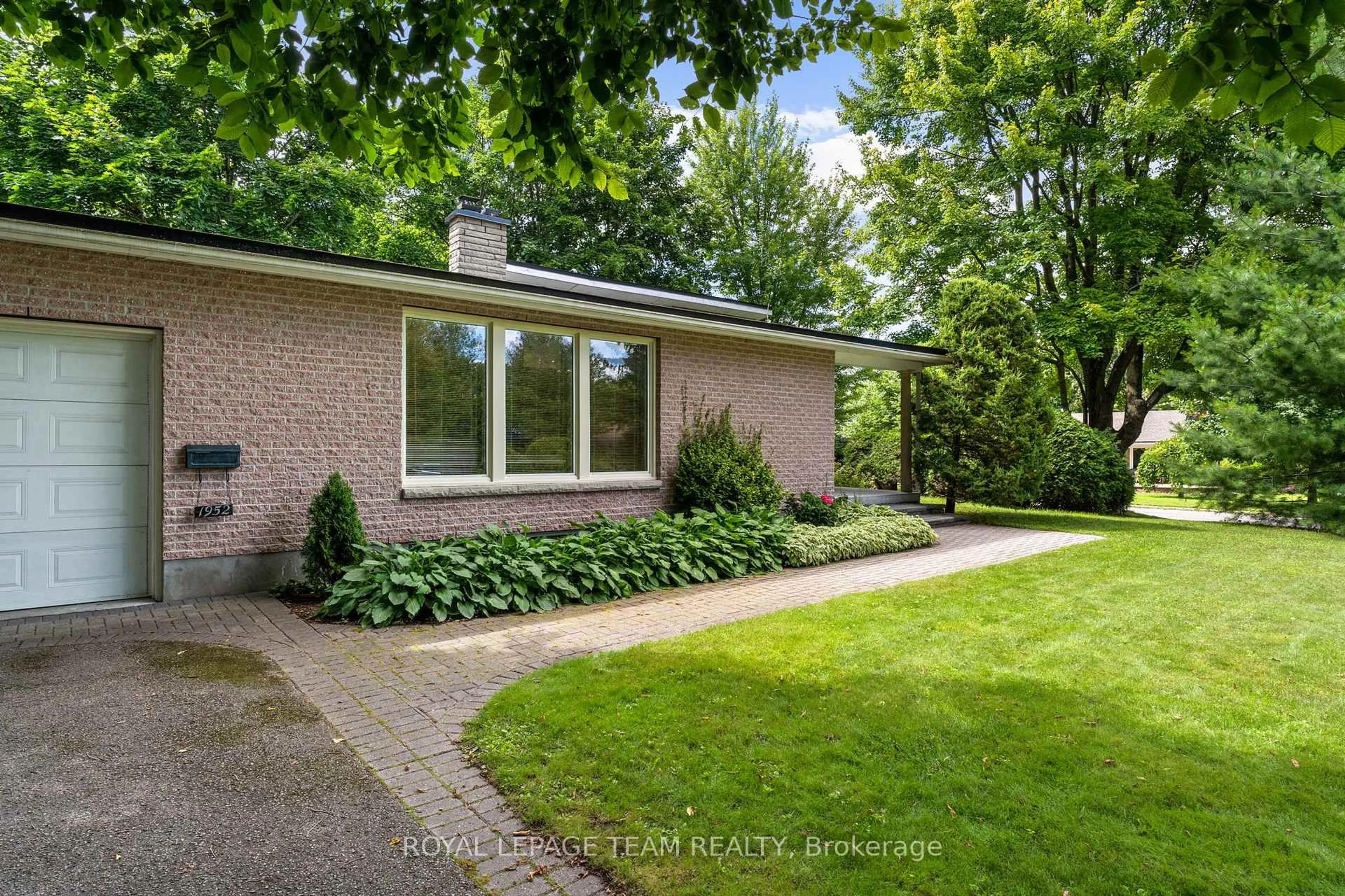 Home with brick exterior material, street for 1952 Fairbanks Ave, Ottawa Ontario K1H 5Y4