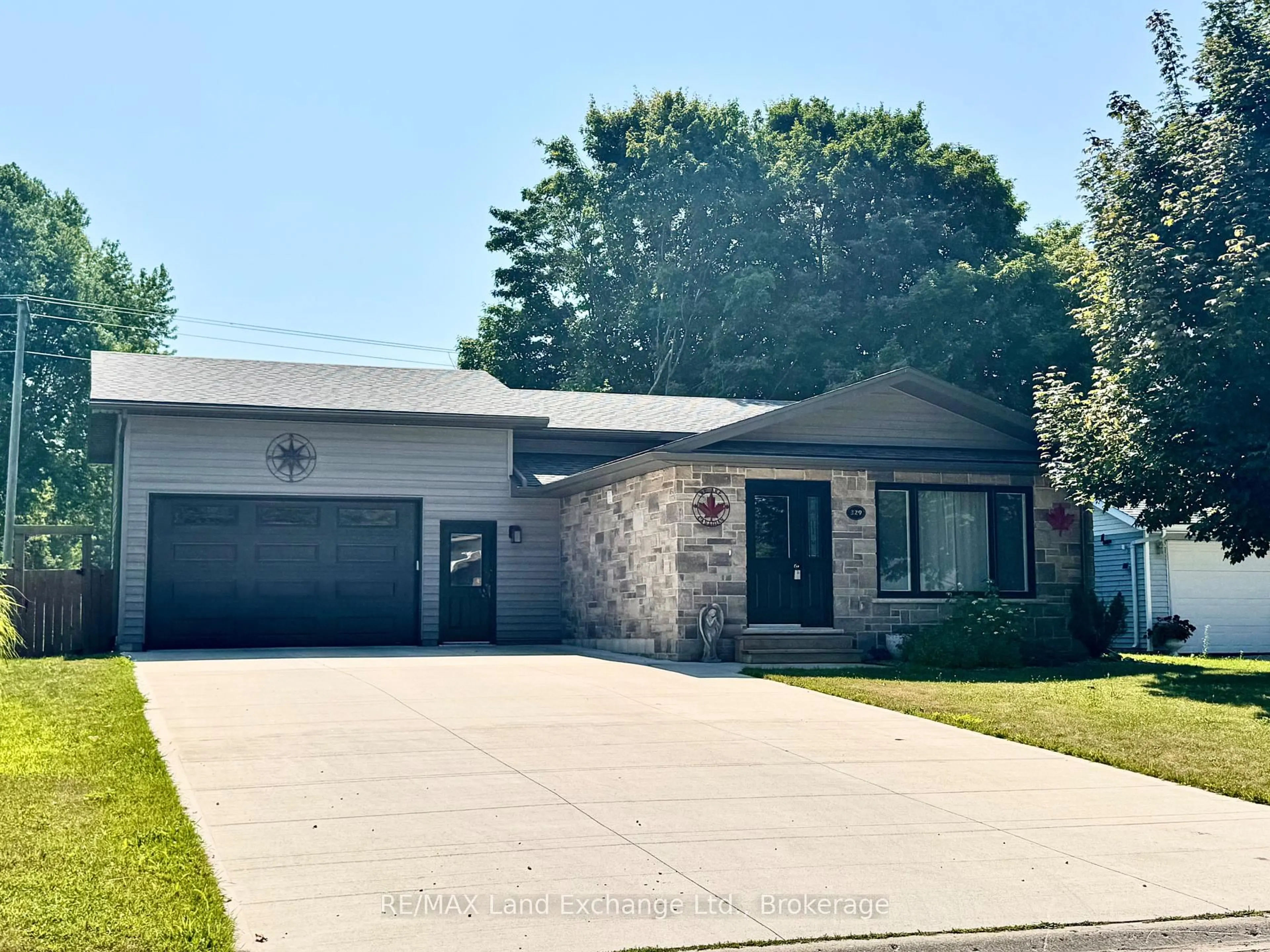 Home with brick exterior material, street for 329 Bricker St, Saugeen Shores Ontario N0H 2C1