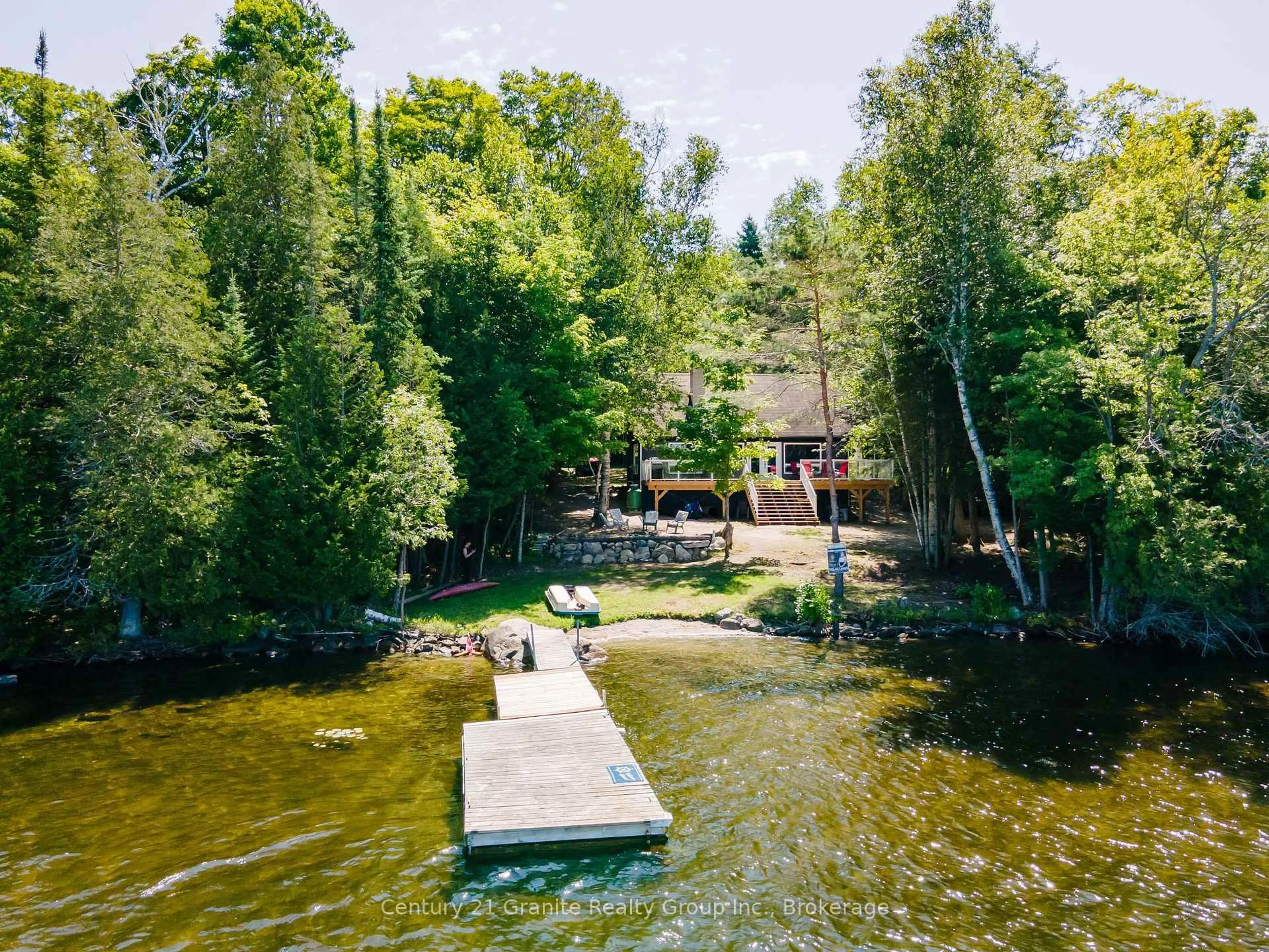A pic from outside/outdoor area/front of a property/back of a property/a pic from drone, water/lake/river/ocean view for 2347 Kashagawigamog Lake Rd, Minden Hills Ontario K0M 2K0