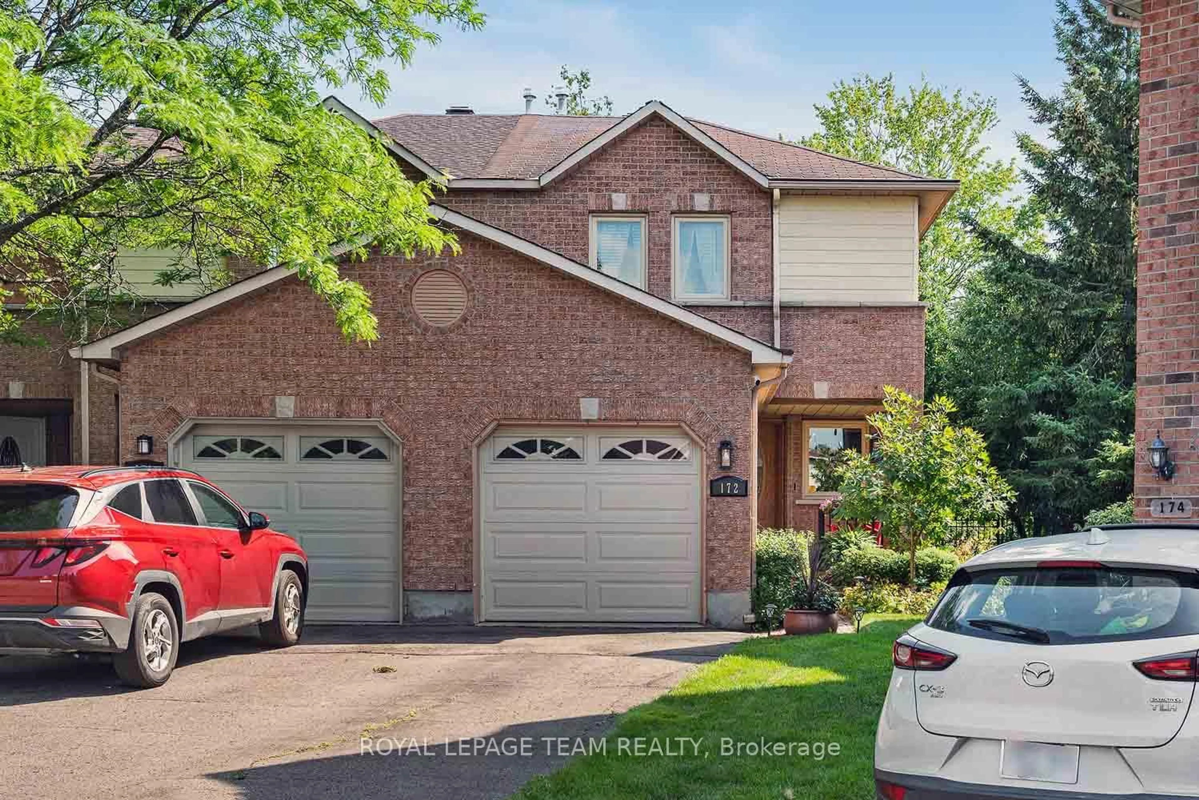 Home with brick exterior material, street for 172 Southport Dr, Ottawa Ontario K1T 3P4