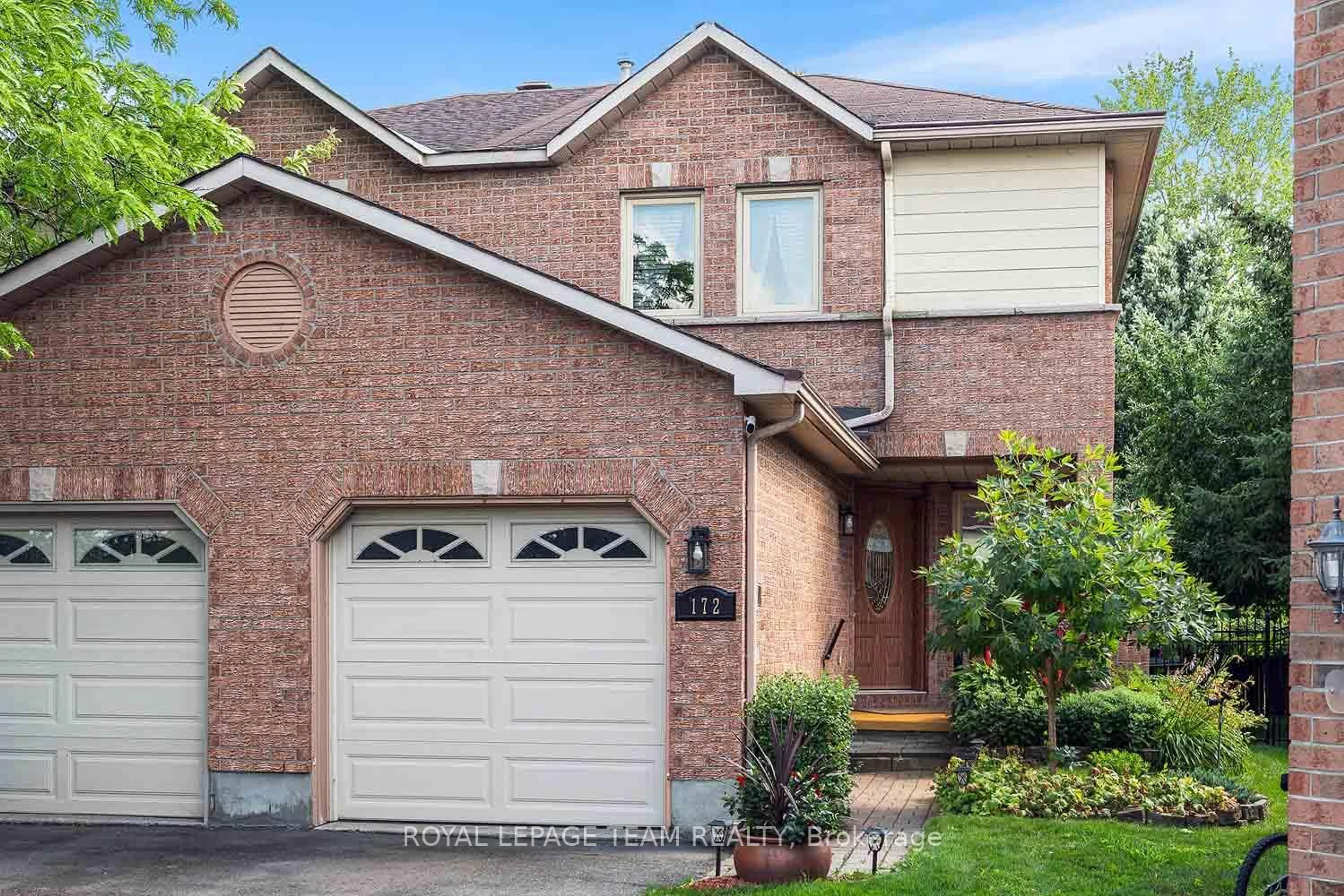 Home with brick exterior material, street for 172 Southport Dr, Ottawa Ontario K1T 3P4