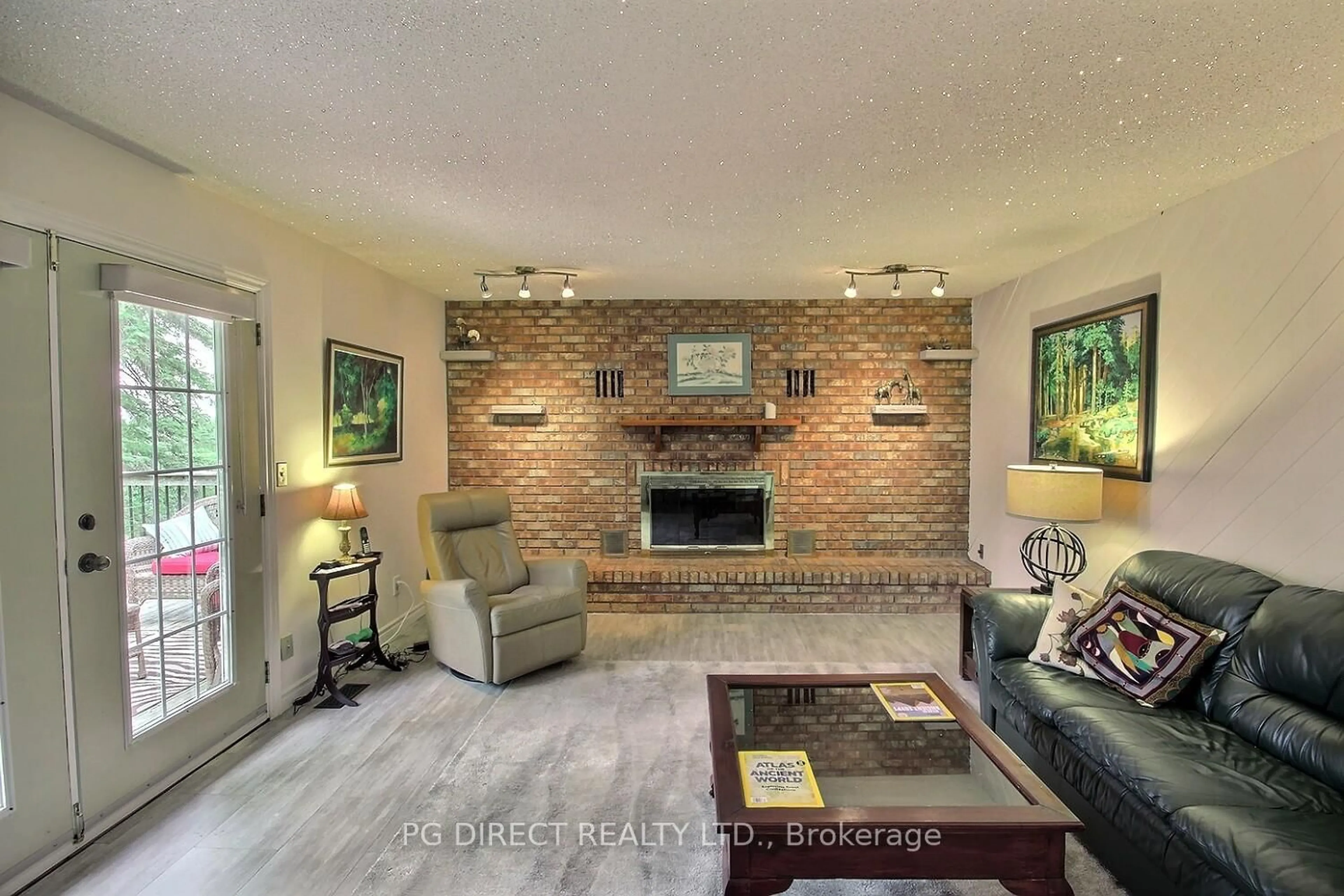 Living room with furniture, ceramic/tile floor for 3268 County 3 Rd, Prince Edward County Ontario K0K 1L0