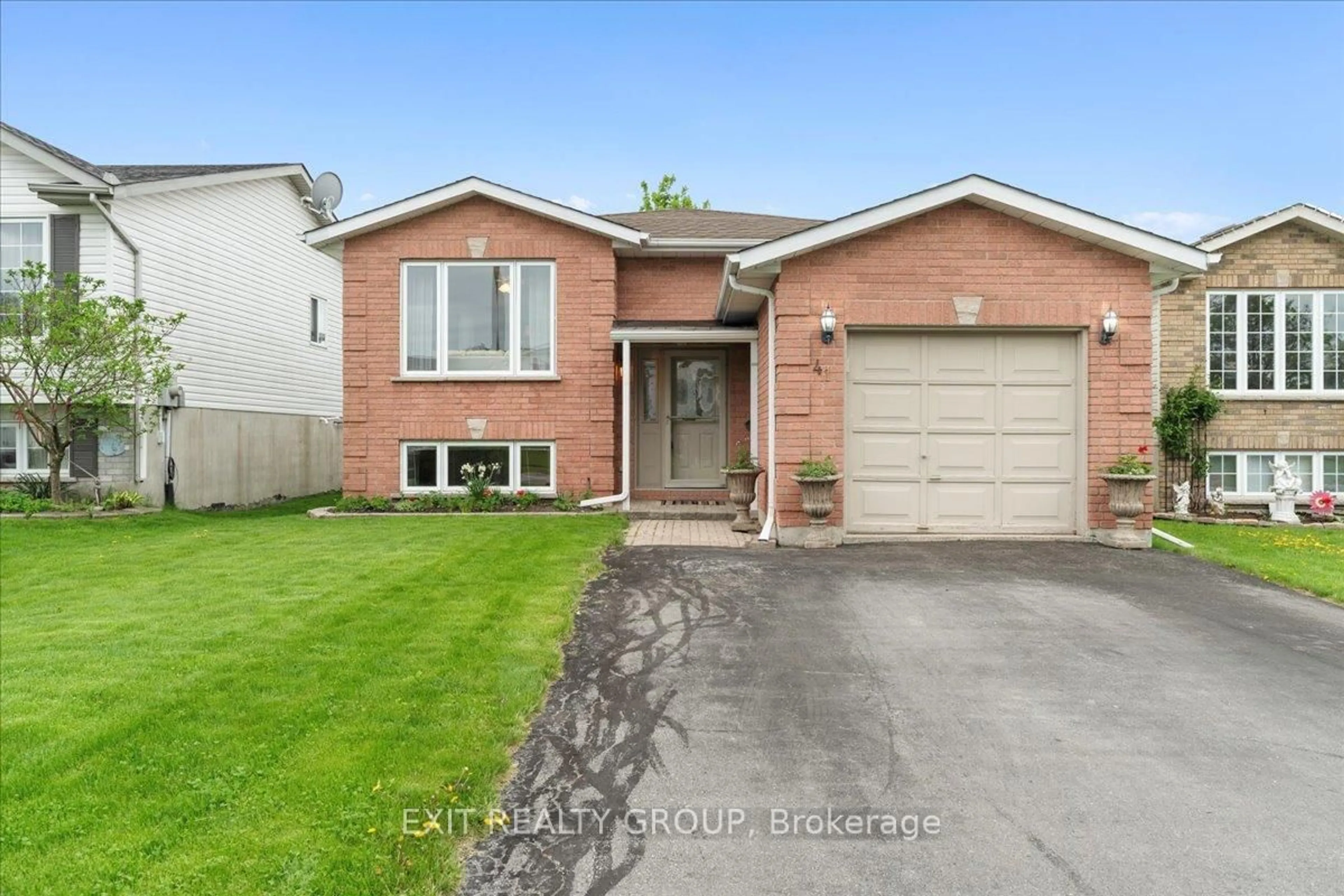 Home with brick exterior material, street for 41 Faraday Gdns, Belleville Ontario K8P 5J5