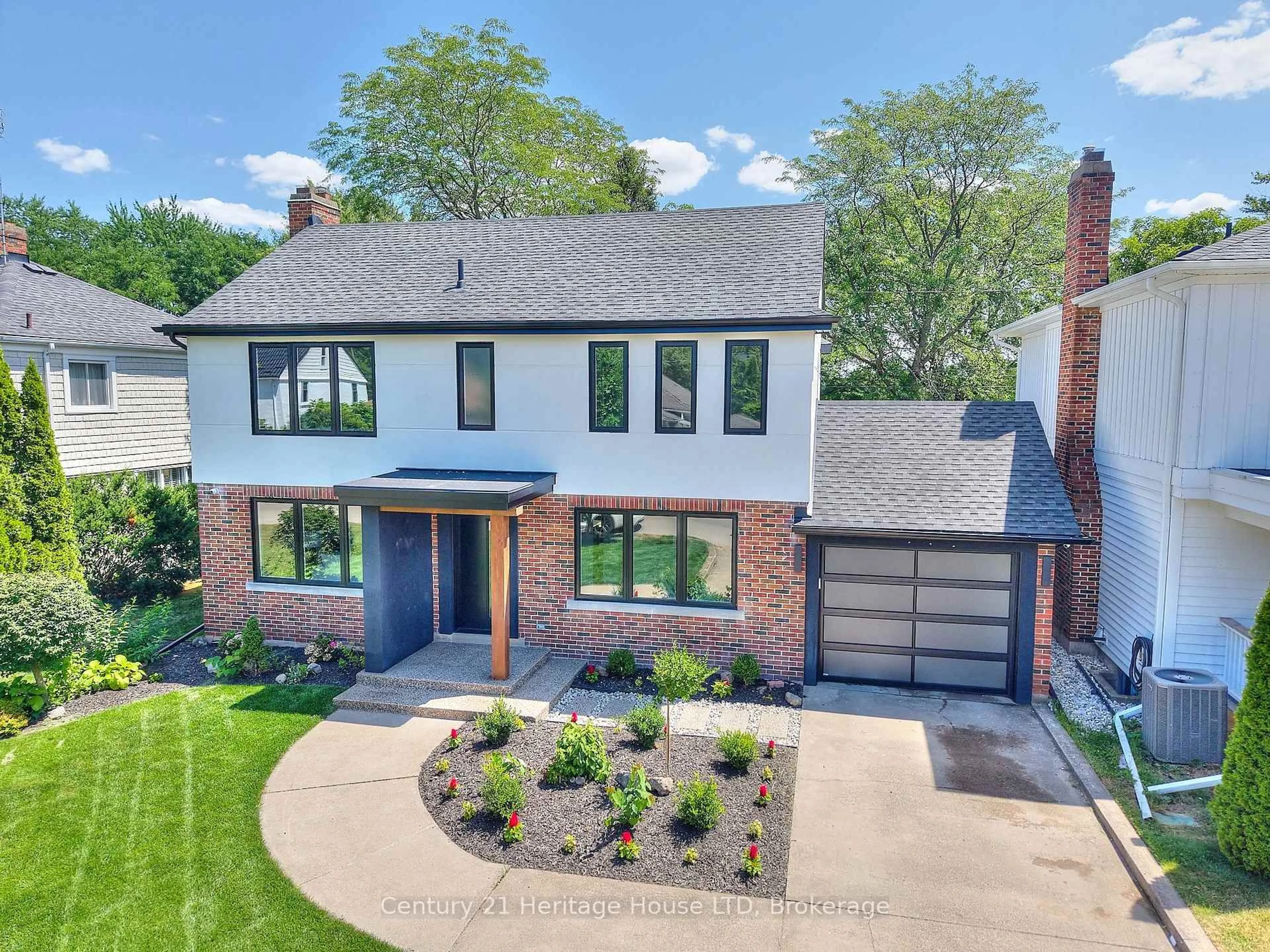 Home with brick exterior material, street for 65 Highland Ave, St. Catharines Ontario L2R 4H9
