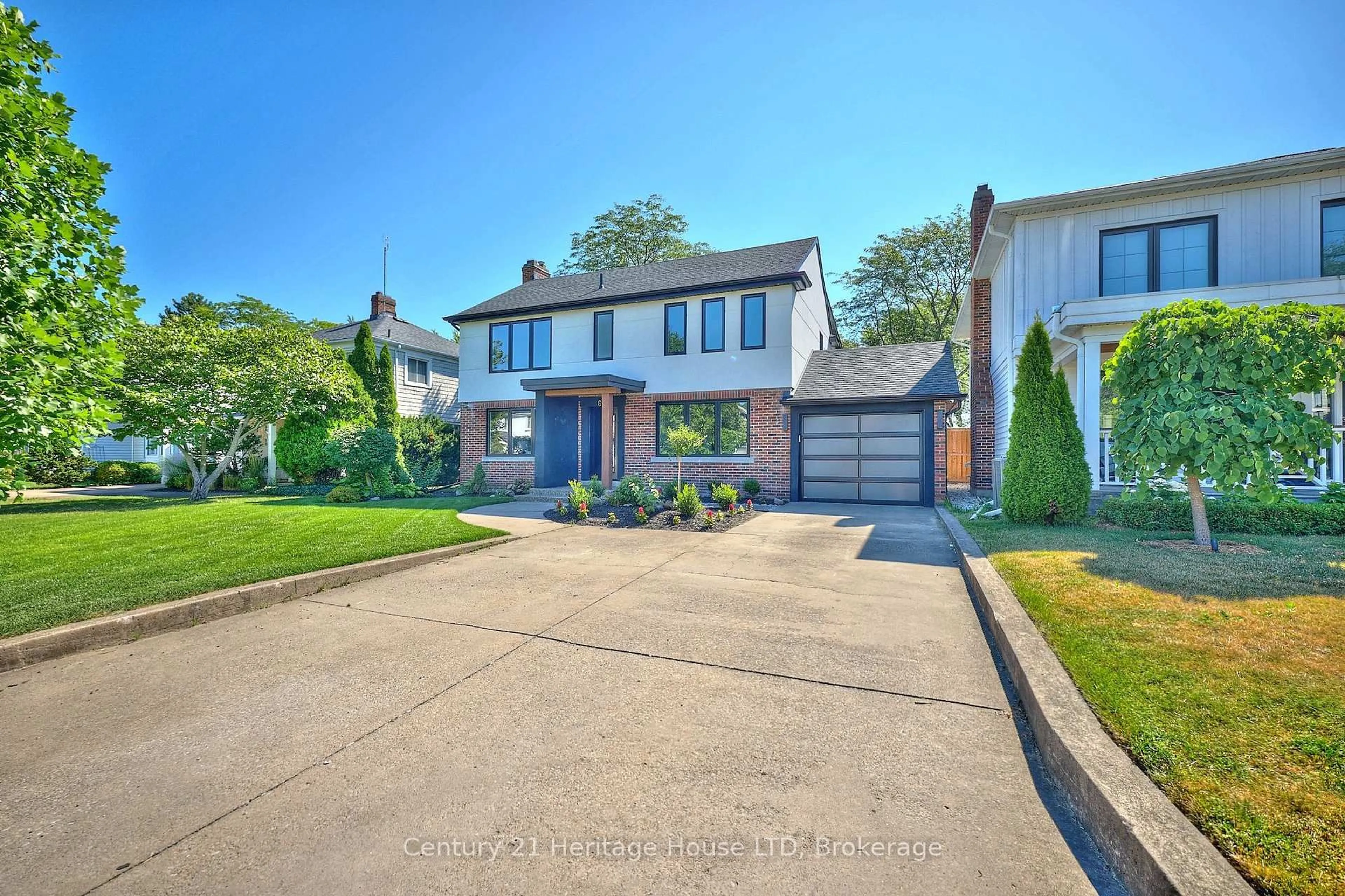 Home with brick exterior material, street for 65 Highland Ave, St. Catharines Ontario L2R 4H9