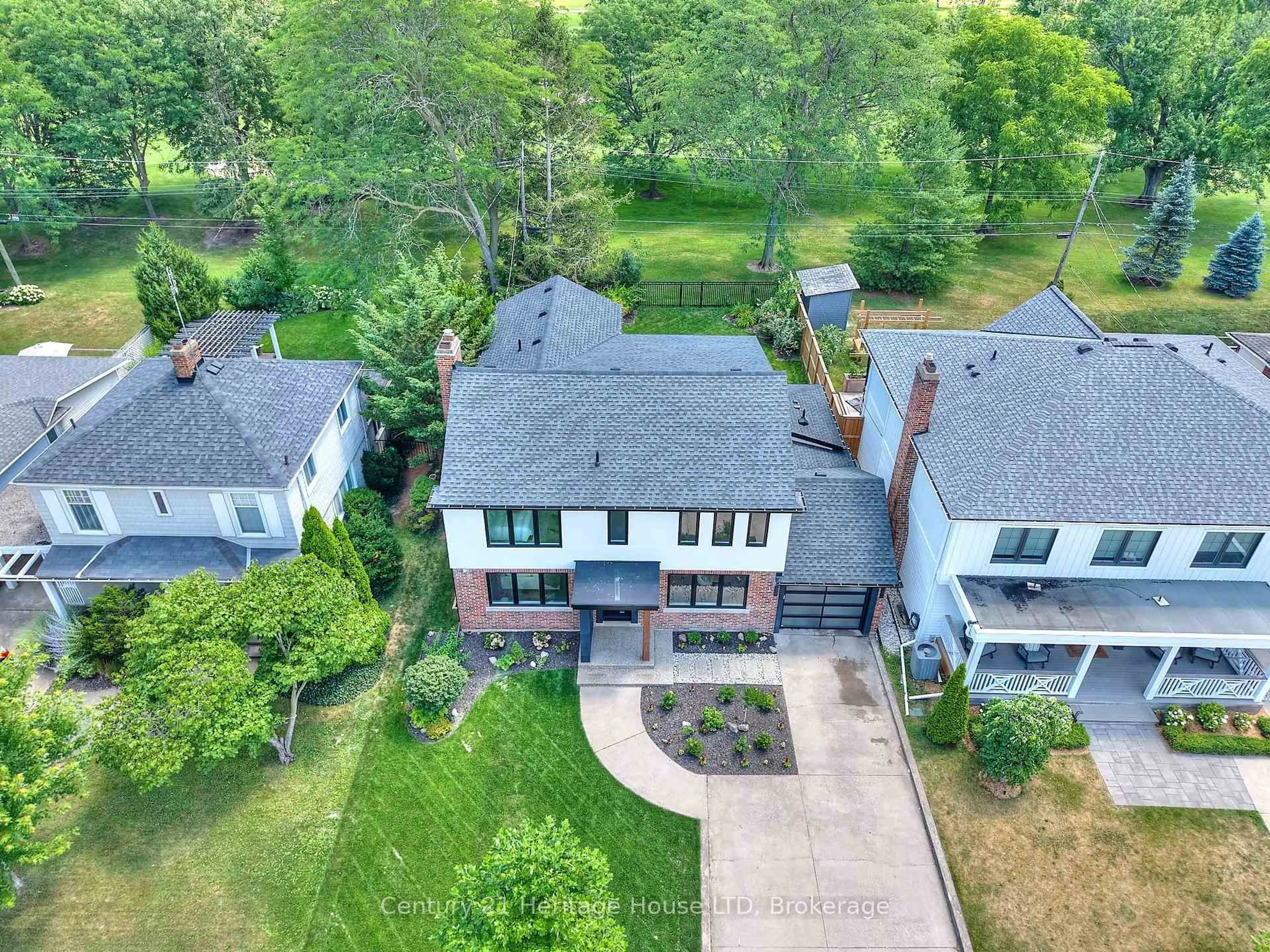 A pic from outside/outdoor area/front of a property/back of a property/a pic from drone, street for 65 Highland Ave, St. Catharines Ontario L2R 4H9