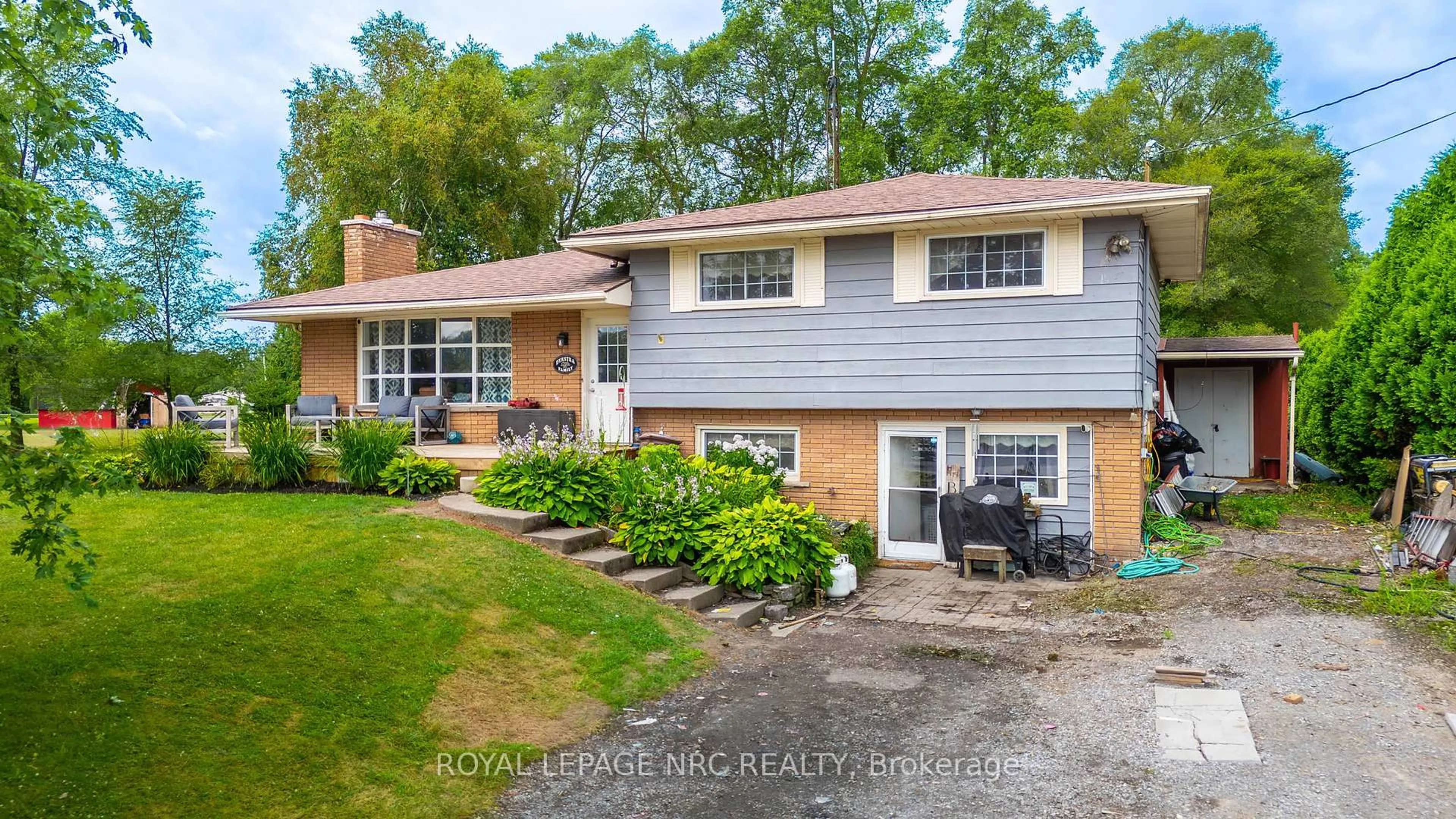 A pic from outside/outdoor area/front of a property/back of a property/a pic from drone, street for 53008 Perry Rd, Wainfleet Ontario L0S 1V0