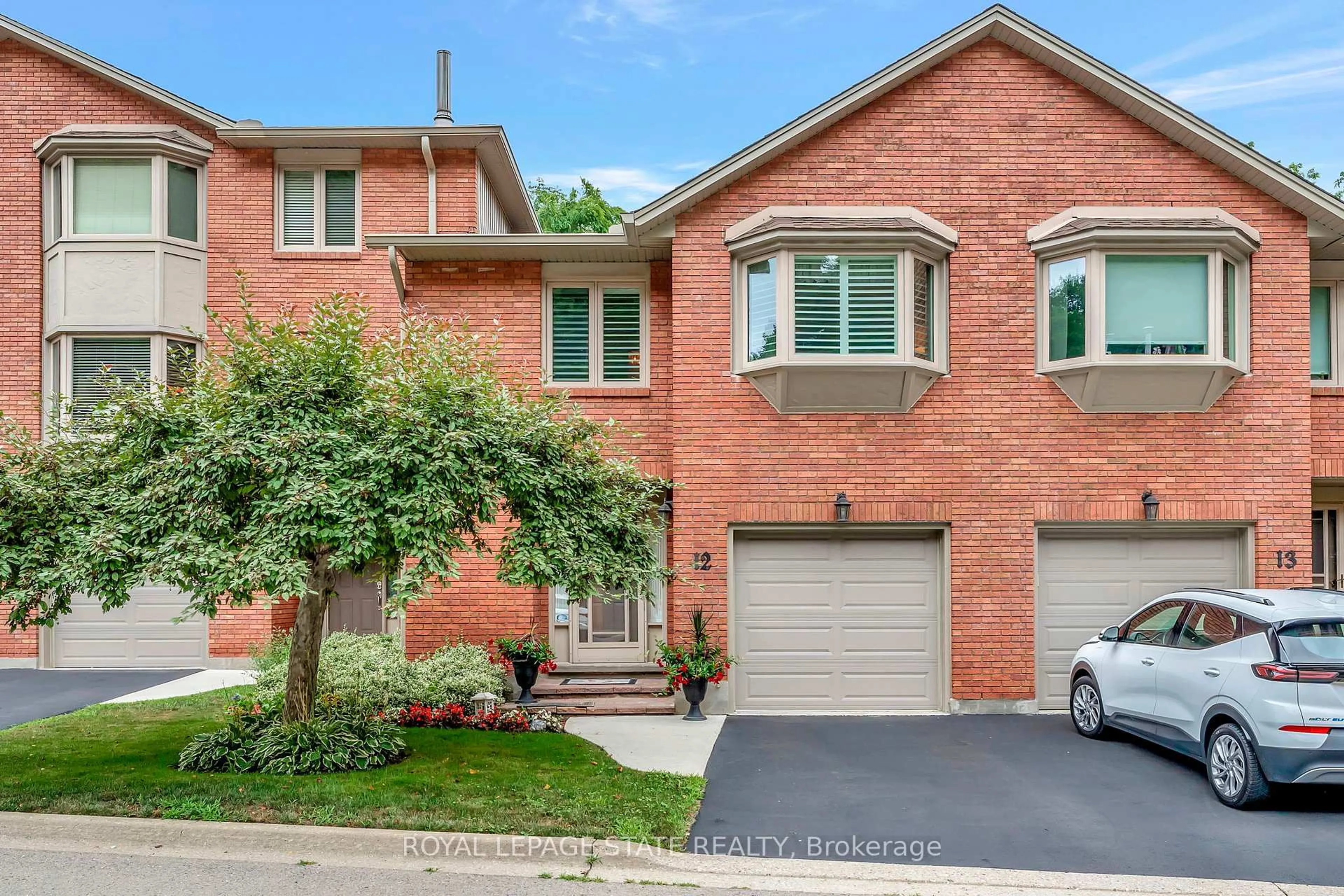 Home with brick exterior material, street for 30 Osler Dr #12, Hamilton Ontario L9H 6W2