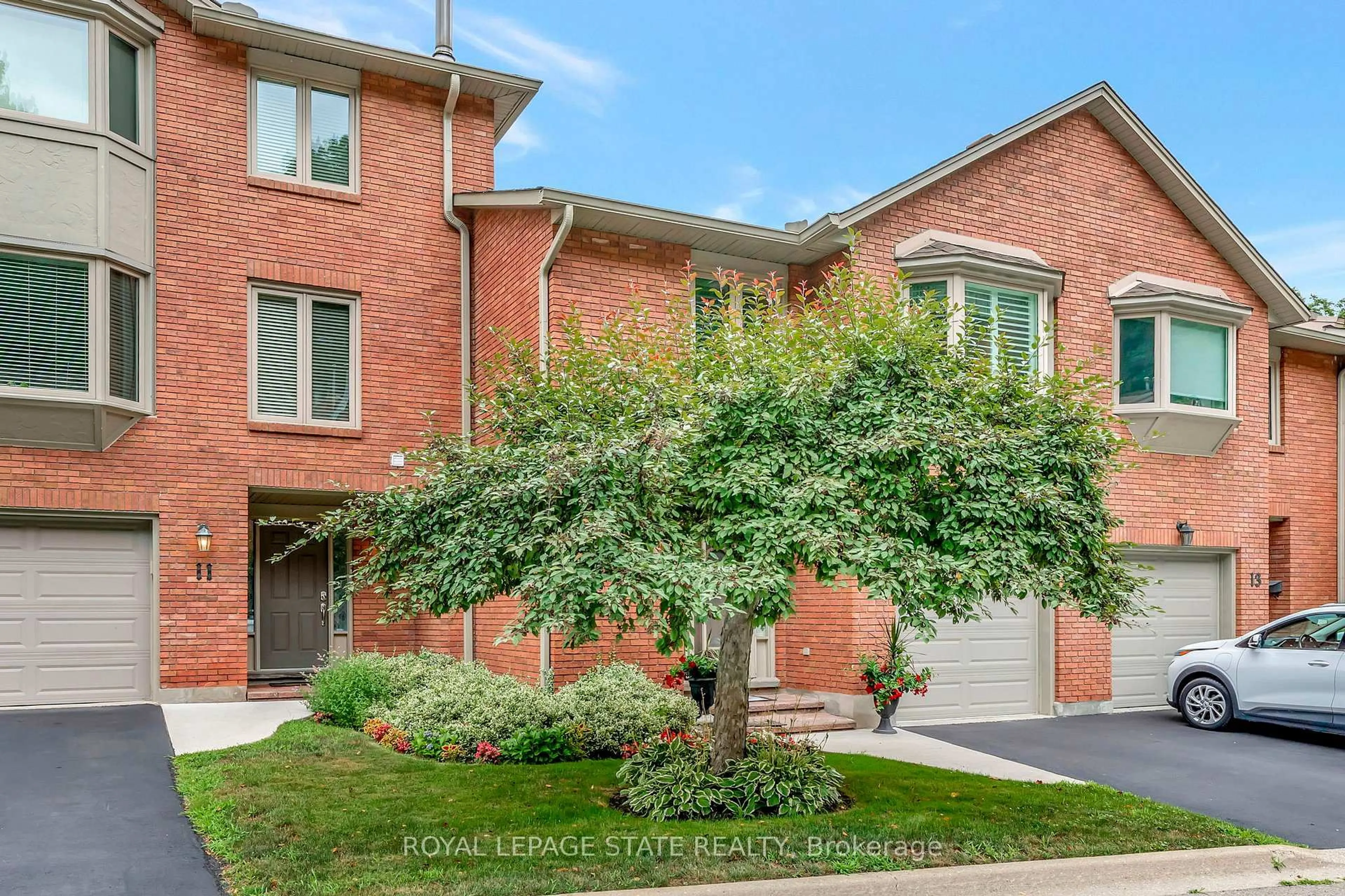 Home with brick exterior material, street for 30 Osler Dr #12, Hamilton Ontario L9H 6W2