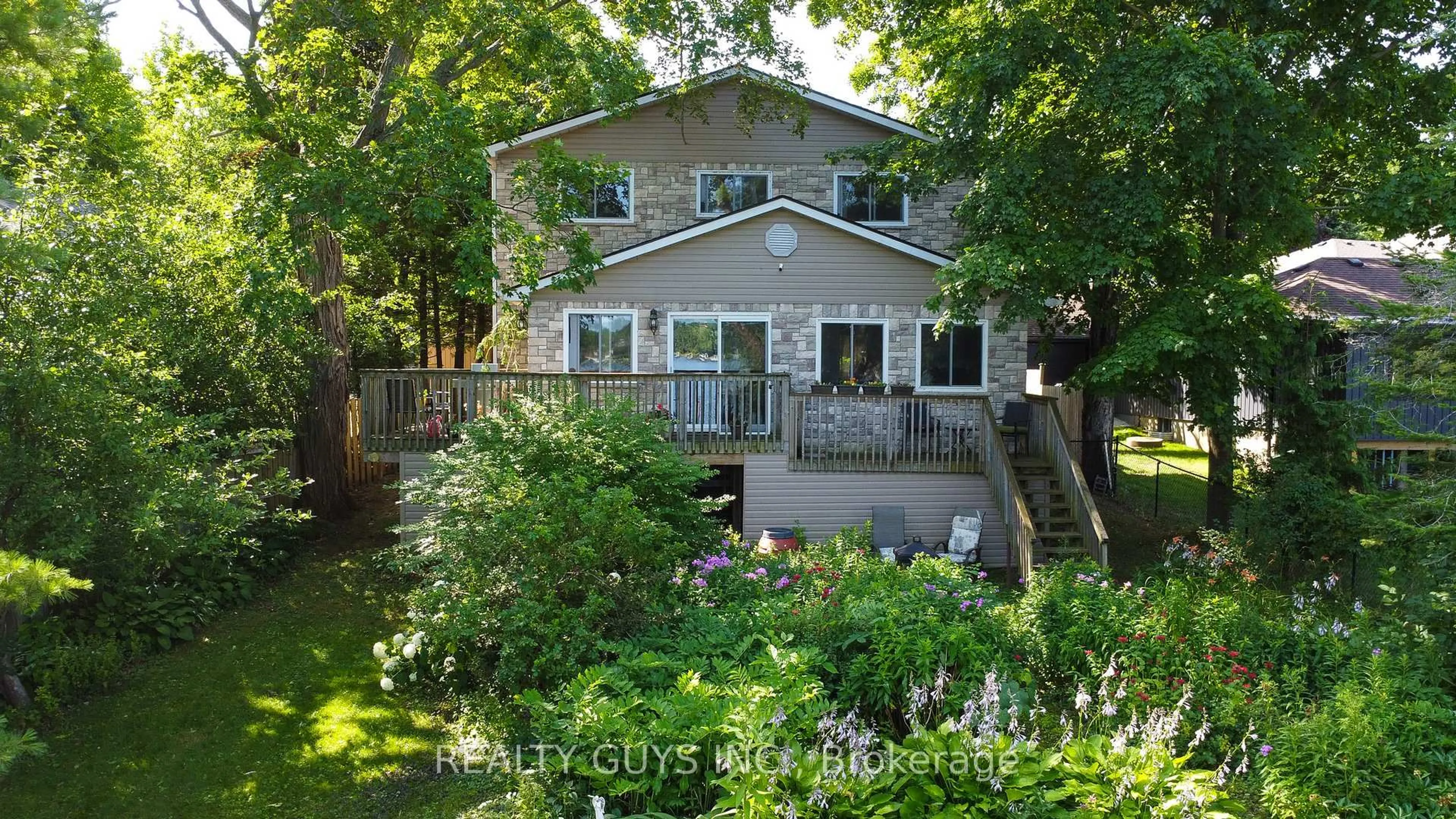 A pic from outside/outdoor area/front of a property/back of a property/a pic from drone, water/lake/river/ocean view for 122 Maryland Dr, Selwyn Ontario K9J 6X3