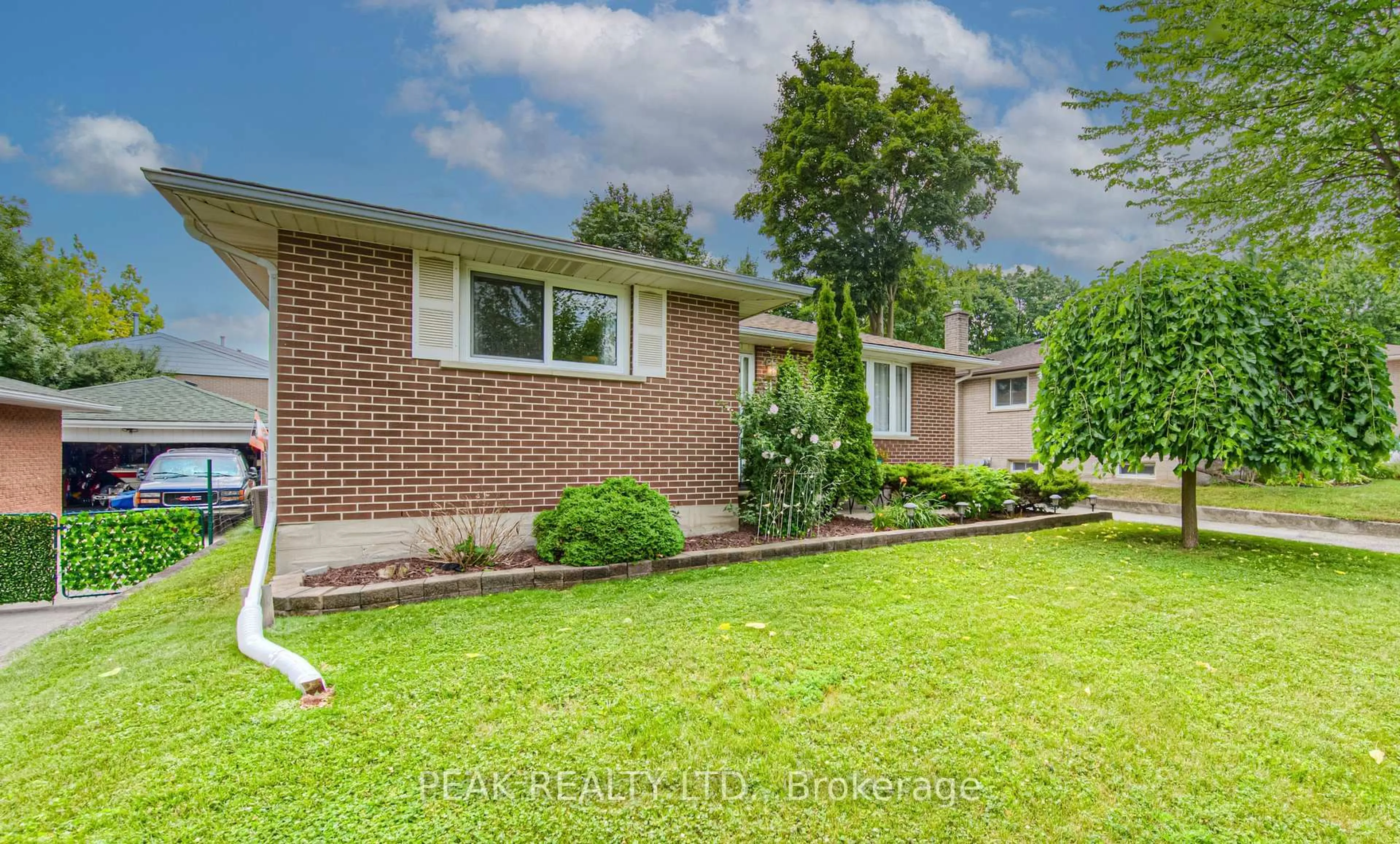 Home with brick exterior material, street for 31 Hillmount St, Kitchener Ontario N2C 2C5