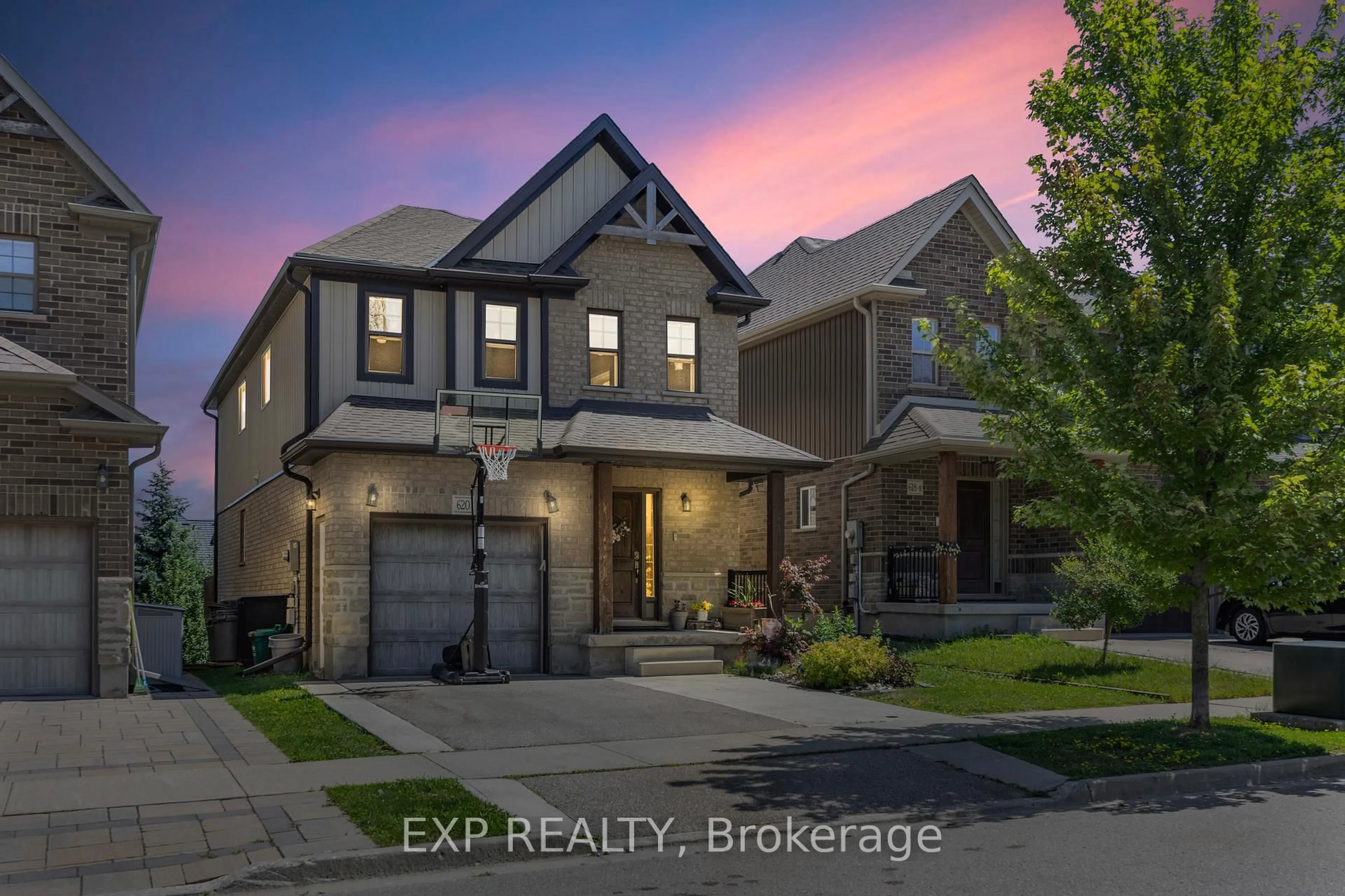 Home with brick exterior material, street for 620 Montpellier Dr, Waterloo Ontario N2T 0B2