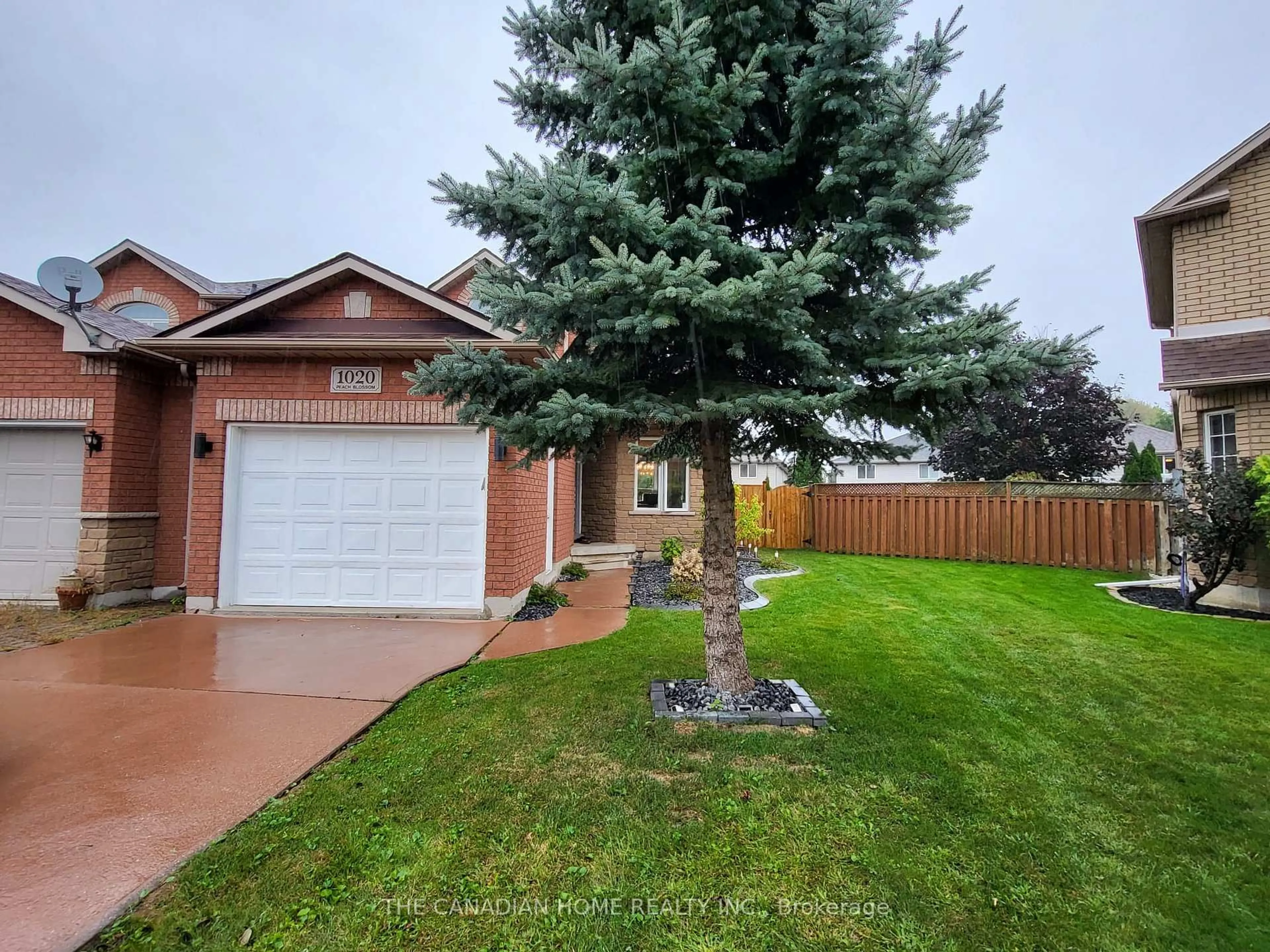 A pic from outside/outdoor area/front of a property/back of a property/a pic from drone, street for 1020 Peach Blossom Cres, Windsor Ontario N9G 2R5