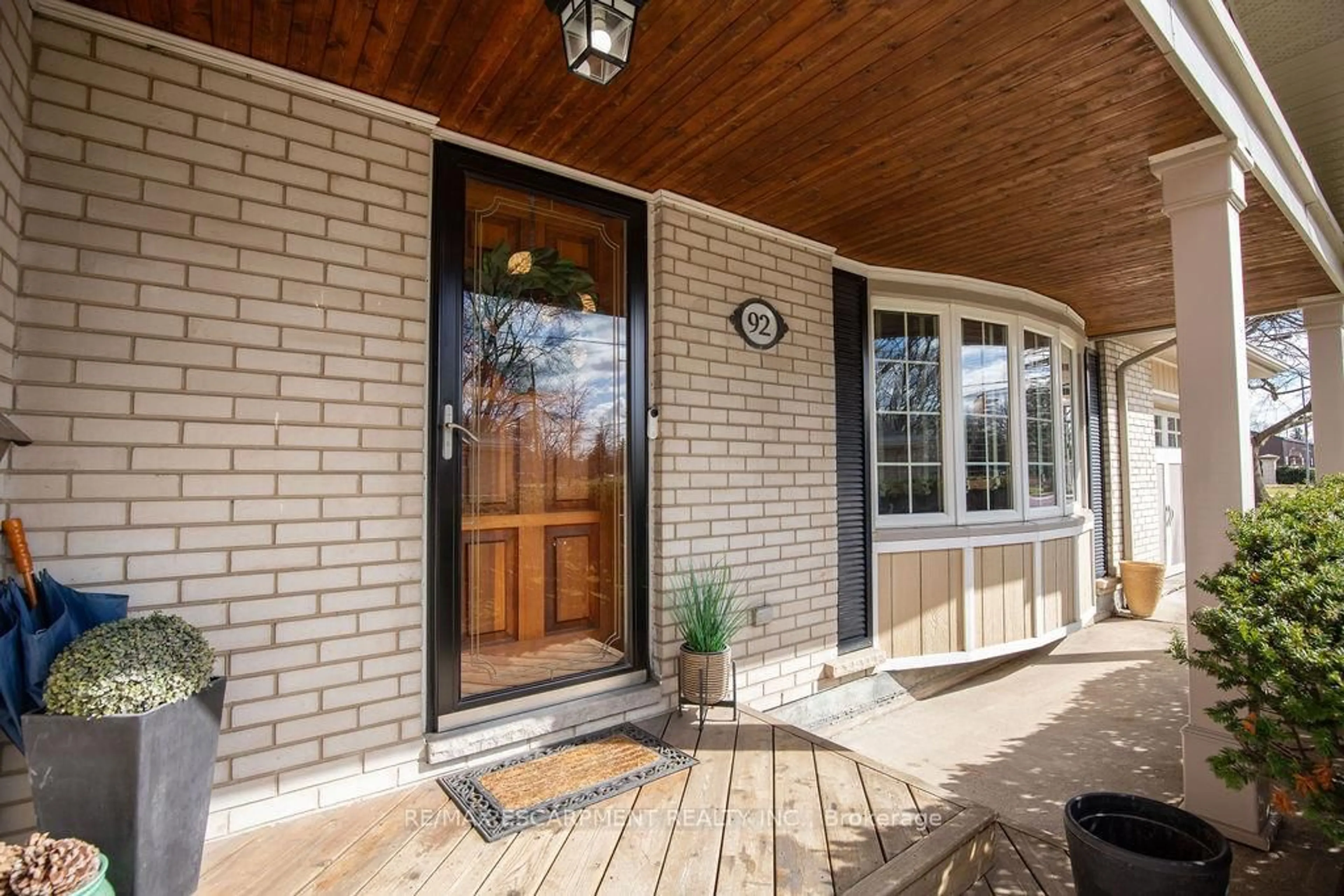 Home with brick exterior material, street for 92 Auchmar Rd, Hamilton Ontario L9C 1C5