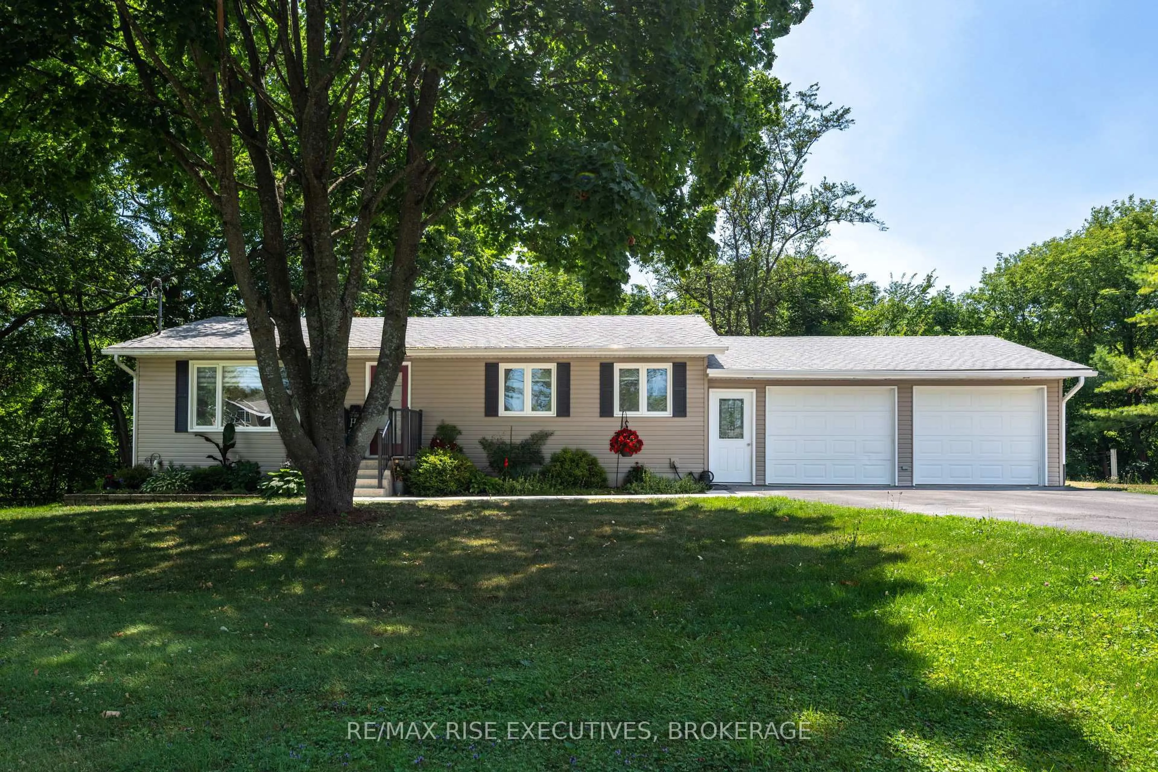 Home with vinyl exterior material, street for 3419 Round Lake Rd, Inverary Ontario K0H 1X0