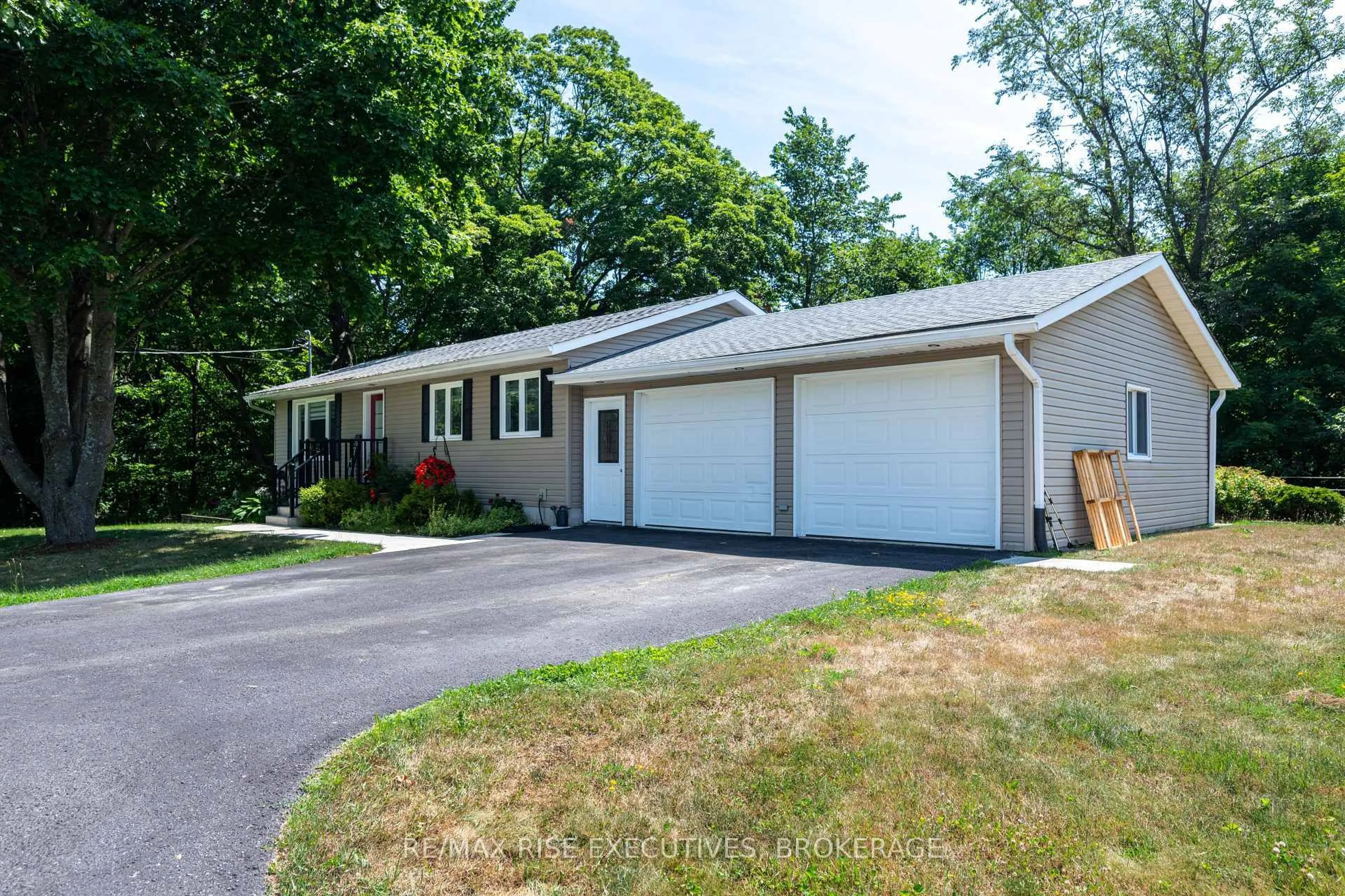 Home with vinyl exterior material, street for 3419 Round Lake Rd, Inverary Ontario K0H 1X0