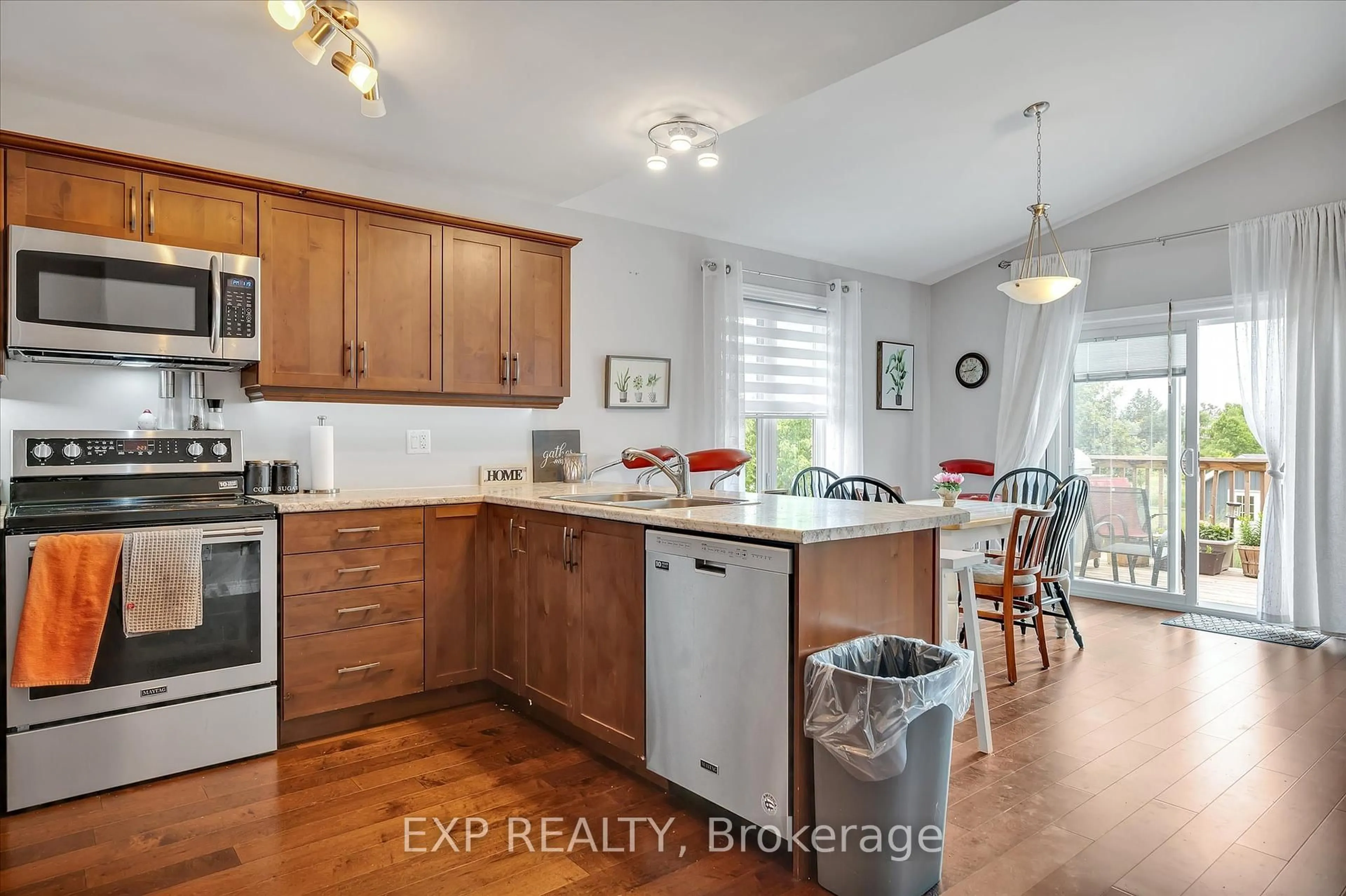 Open concept kitchen, wood/laminate floor for 29 Darrell Drain Cres, Asphodel-Norwood Ontario K0L 2V0