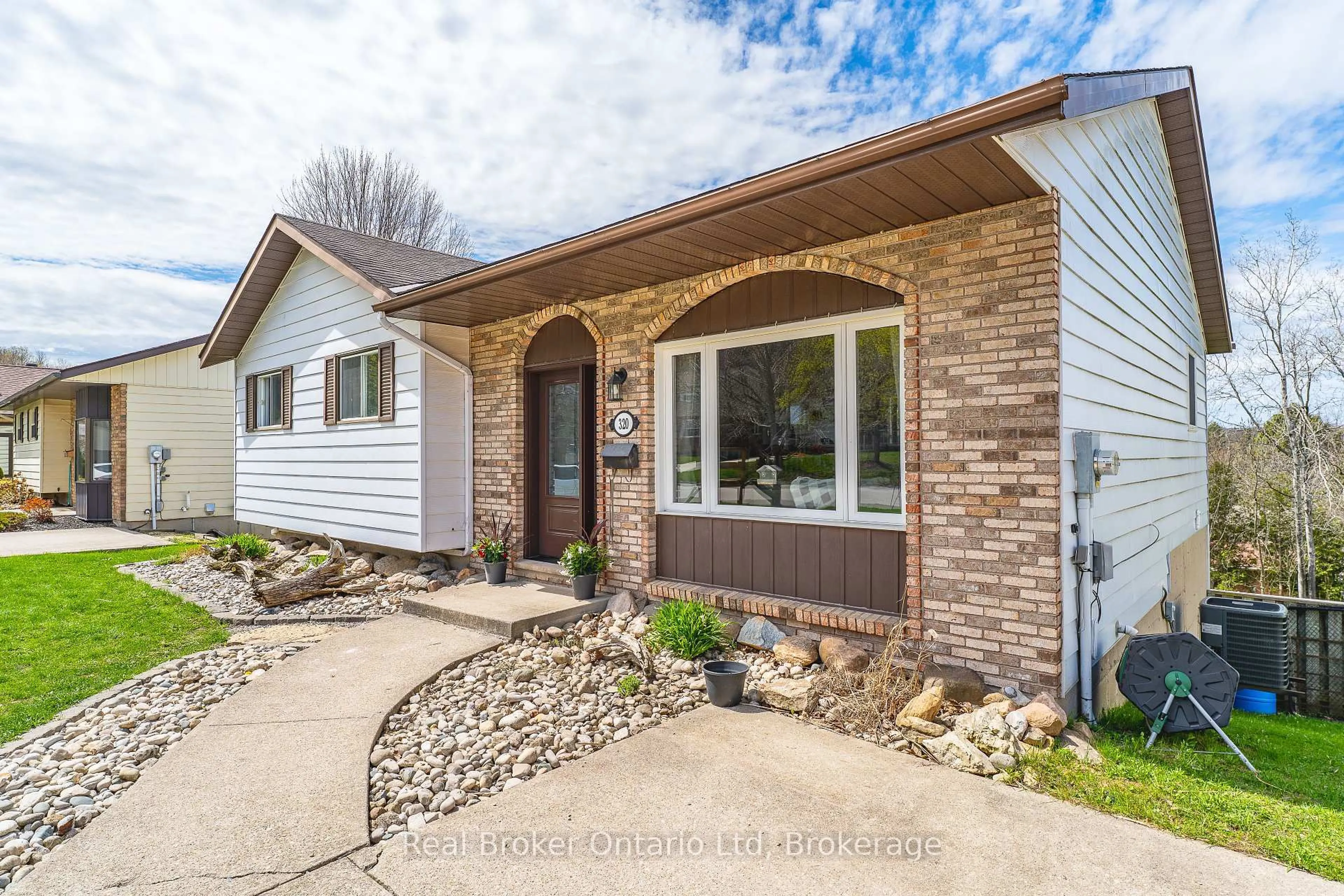 Home with brick exterior material, street for 320 8th 'A' Ave, Owen Sound Ontario N4K 3A2