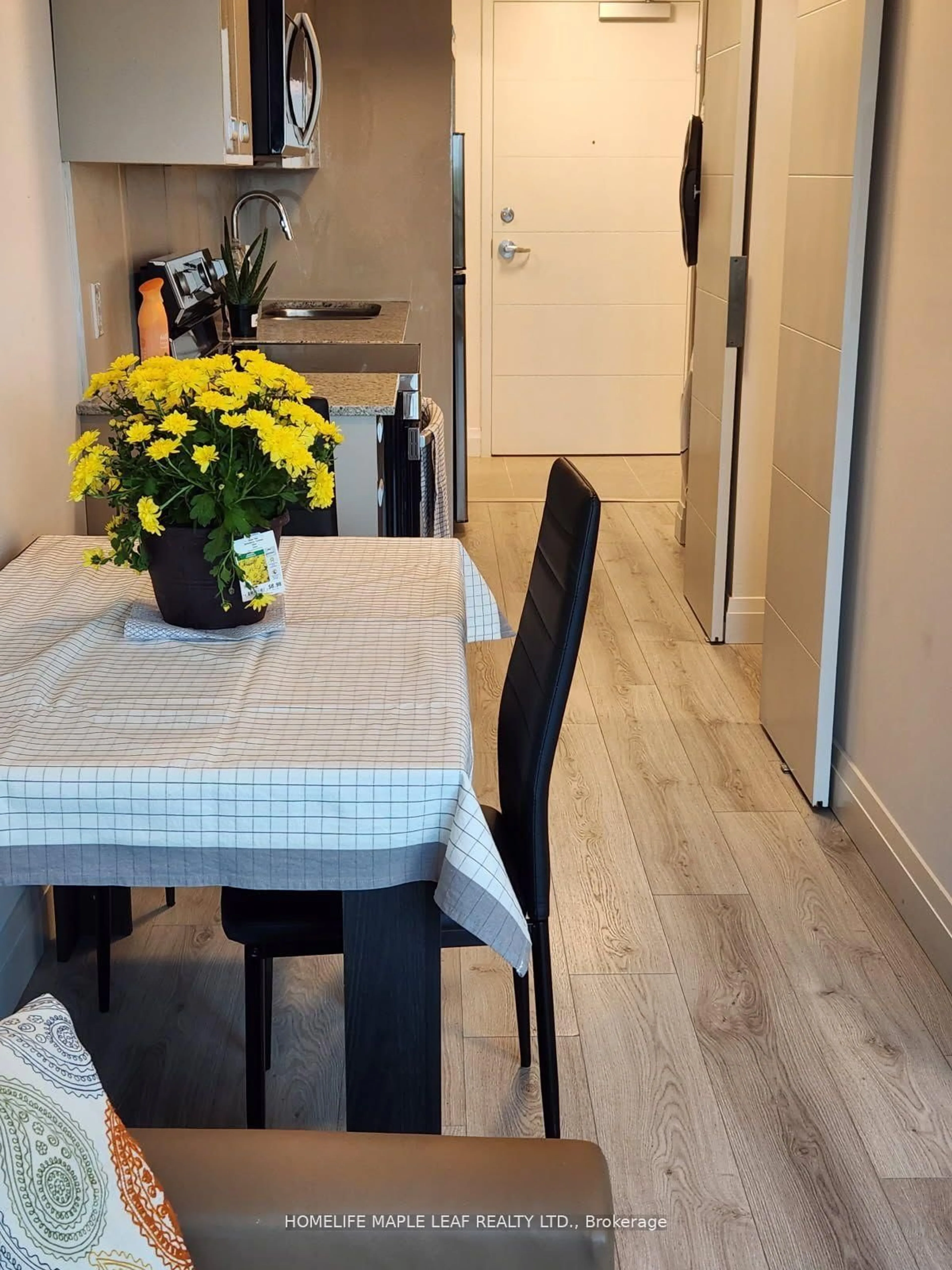 Dining room, wood/laminate floor for 652 PRINCESS St #710, Kingston Ontario K7L 3Z9