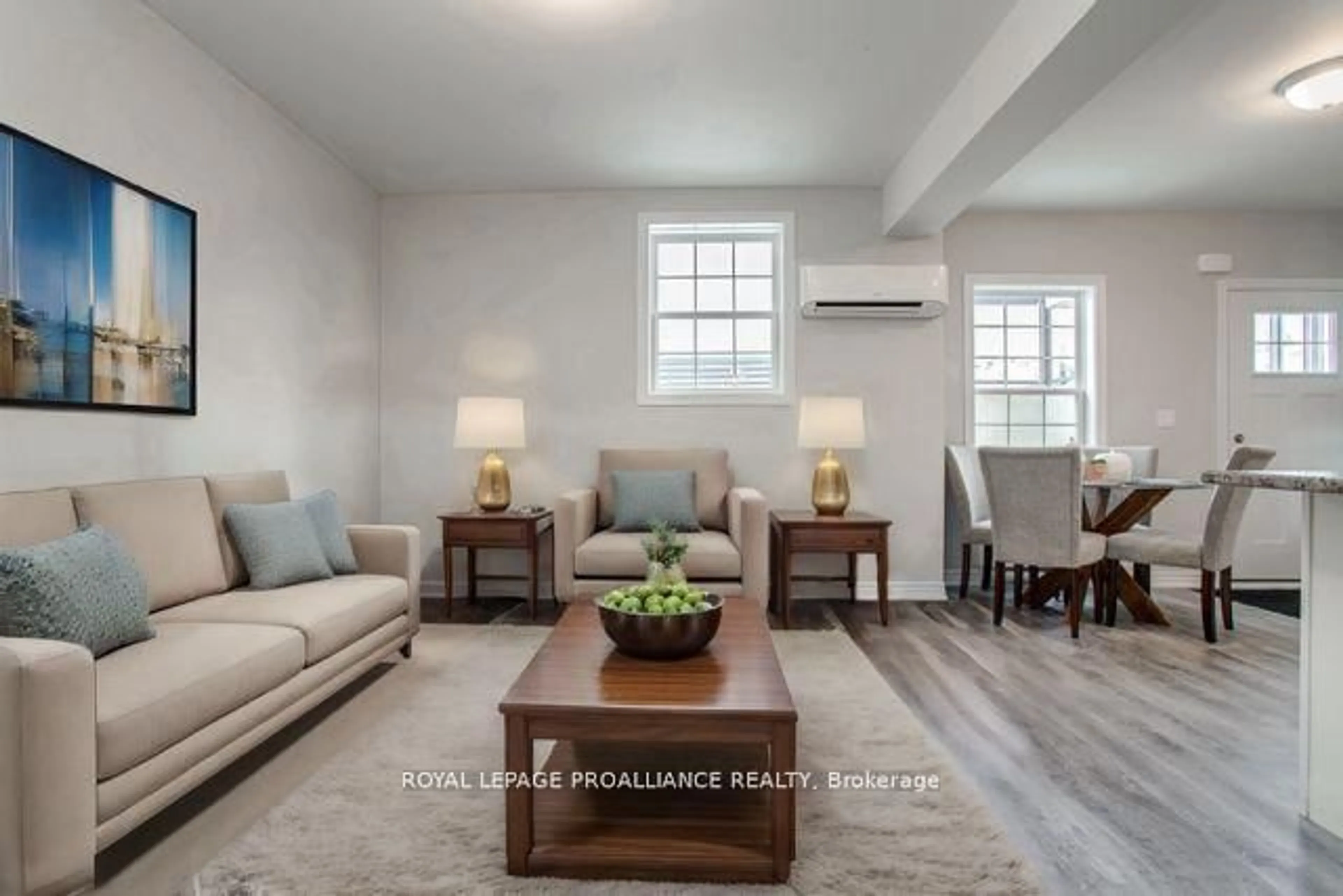 Living room with furniture, wood/laminate floor for 448 Drewery Rd #703, Cobourg Ontario K9A 1K8