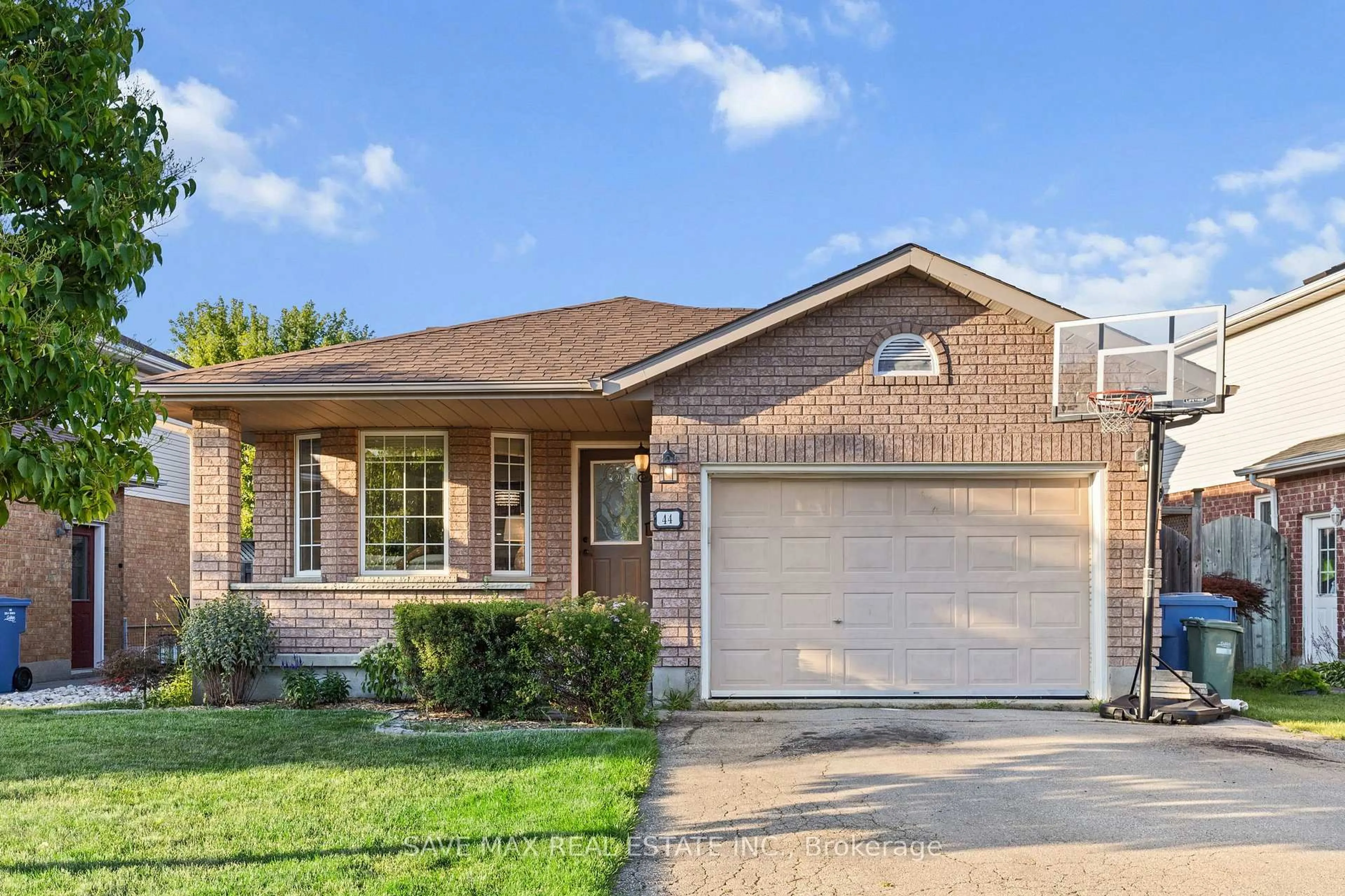 Home with brick exterior material, street for 44 Candlewood Dr, Guelph Ontario N1K 1T5