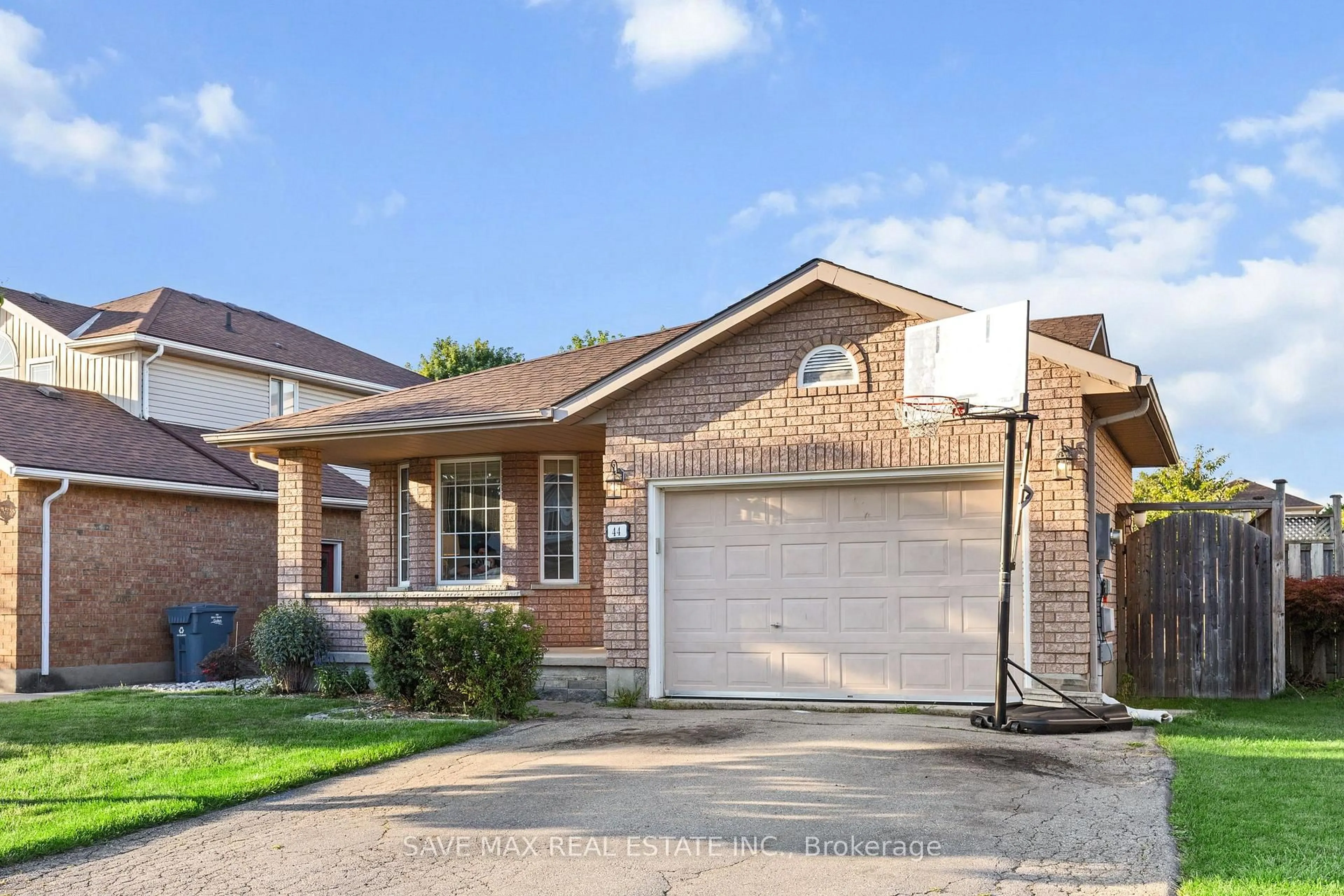 Home with brick exterior material, street for 44 Candlewood Dr, Guelph Ontario N1K 1T5