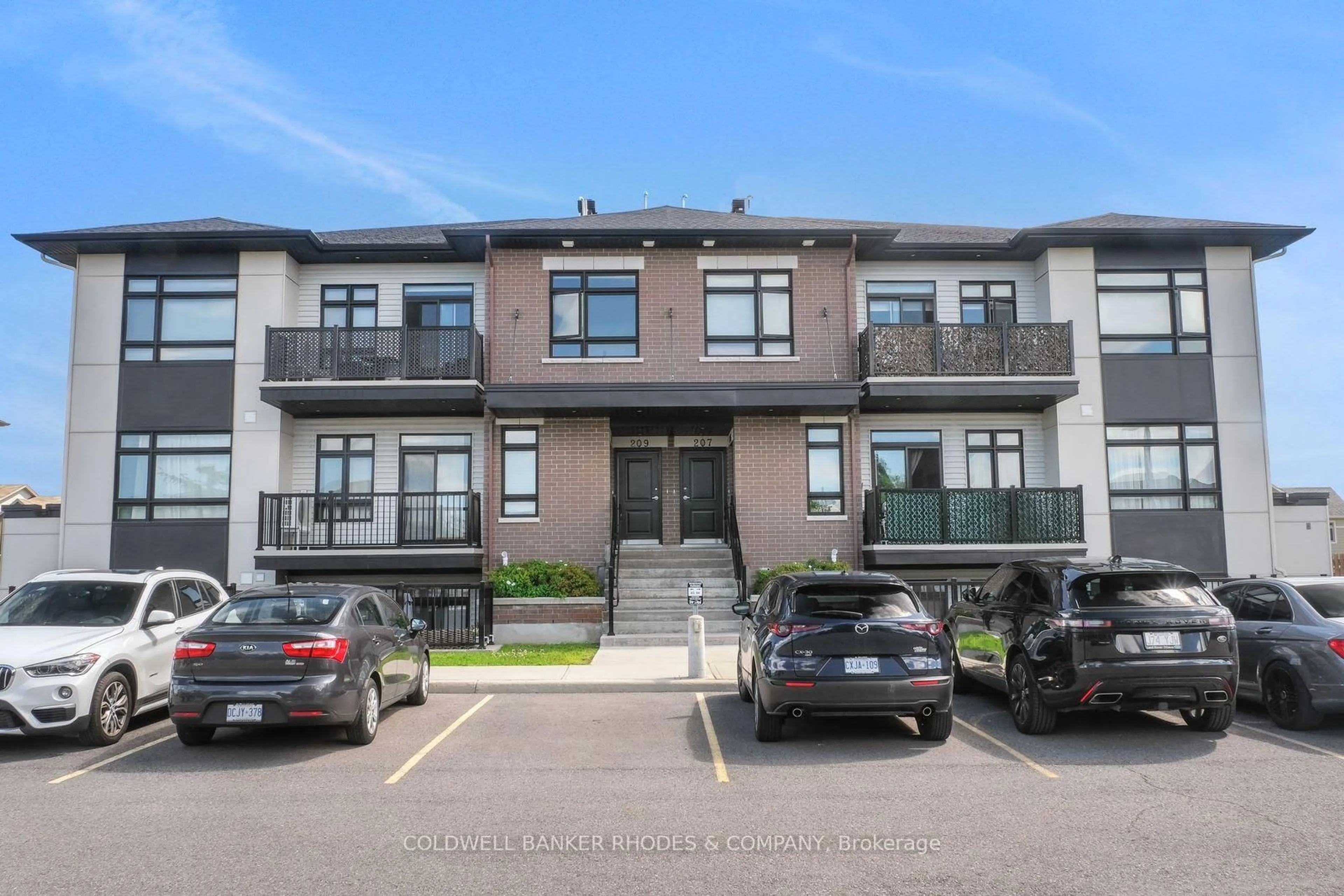 A pic from outside/outdoor area/front of a property/back of a property/a pic from drone, unknown for 209 Big Sky Private #23, Ottawa Ontario K1T 0M8