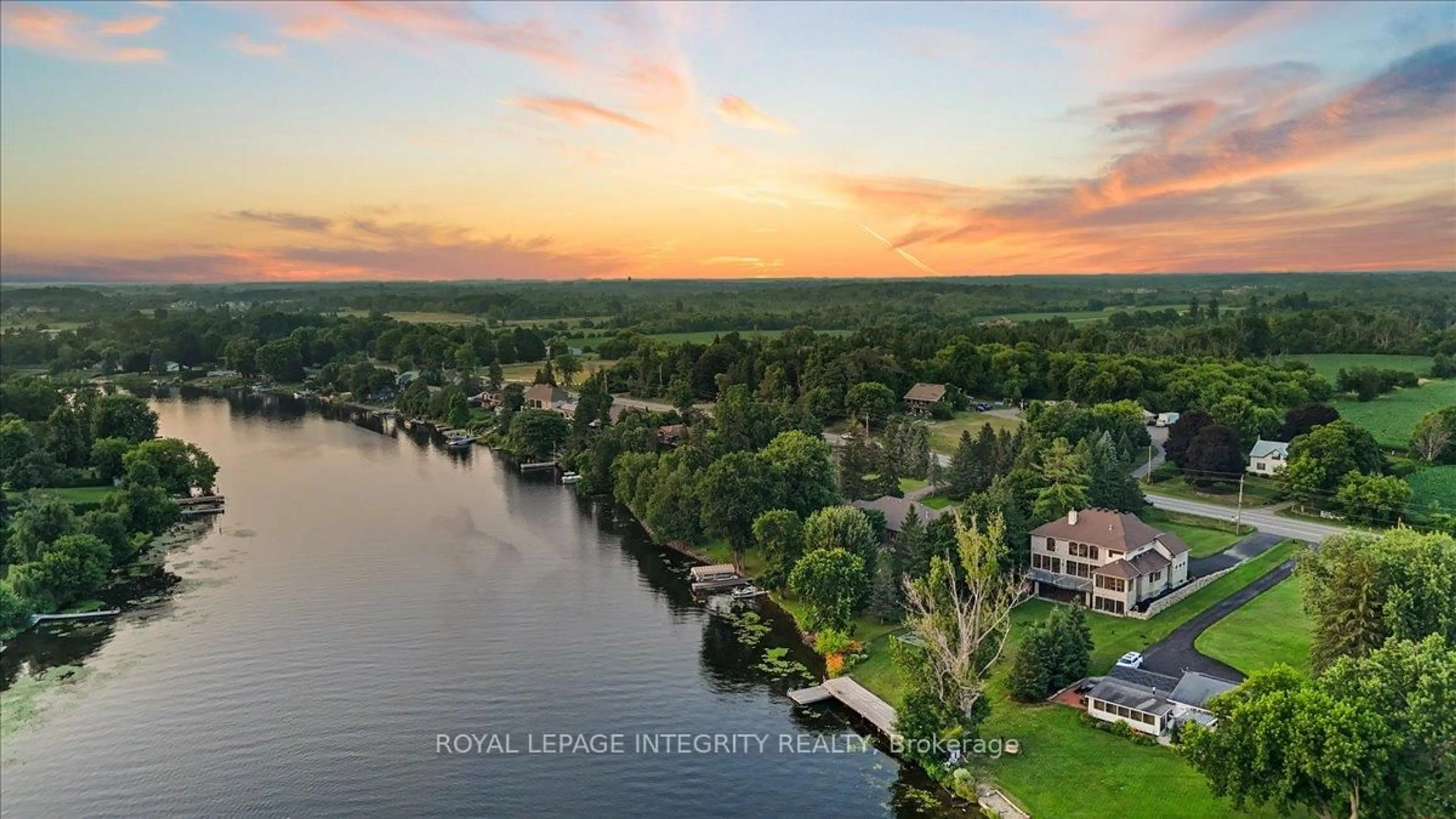 A pic from outside/outdoor area/front of a property/back of a property/a pic from drone, water/lake/river/ocean view for 1180 River Rd, Ottawa Ontario K4M 1B4