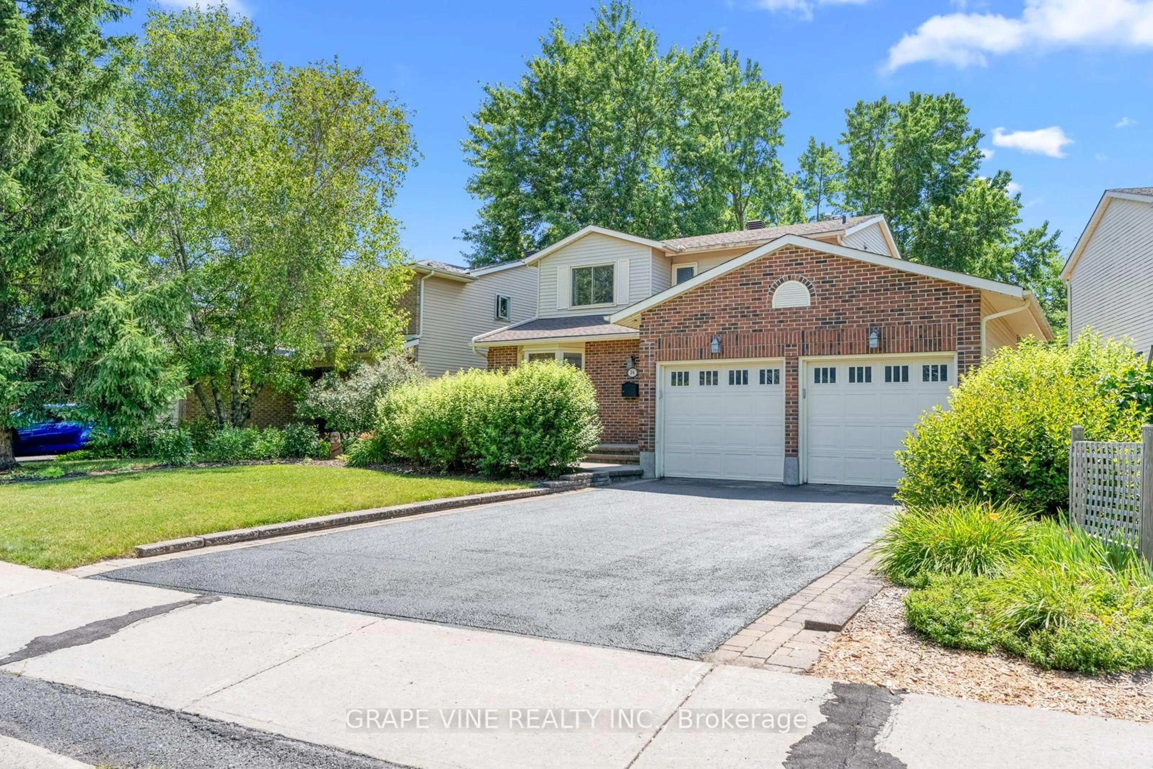 Home with brick exterior material, street for 34 Four Seasons Dr, Ottawa Ontario K2E 7P8