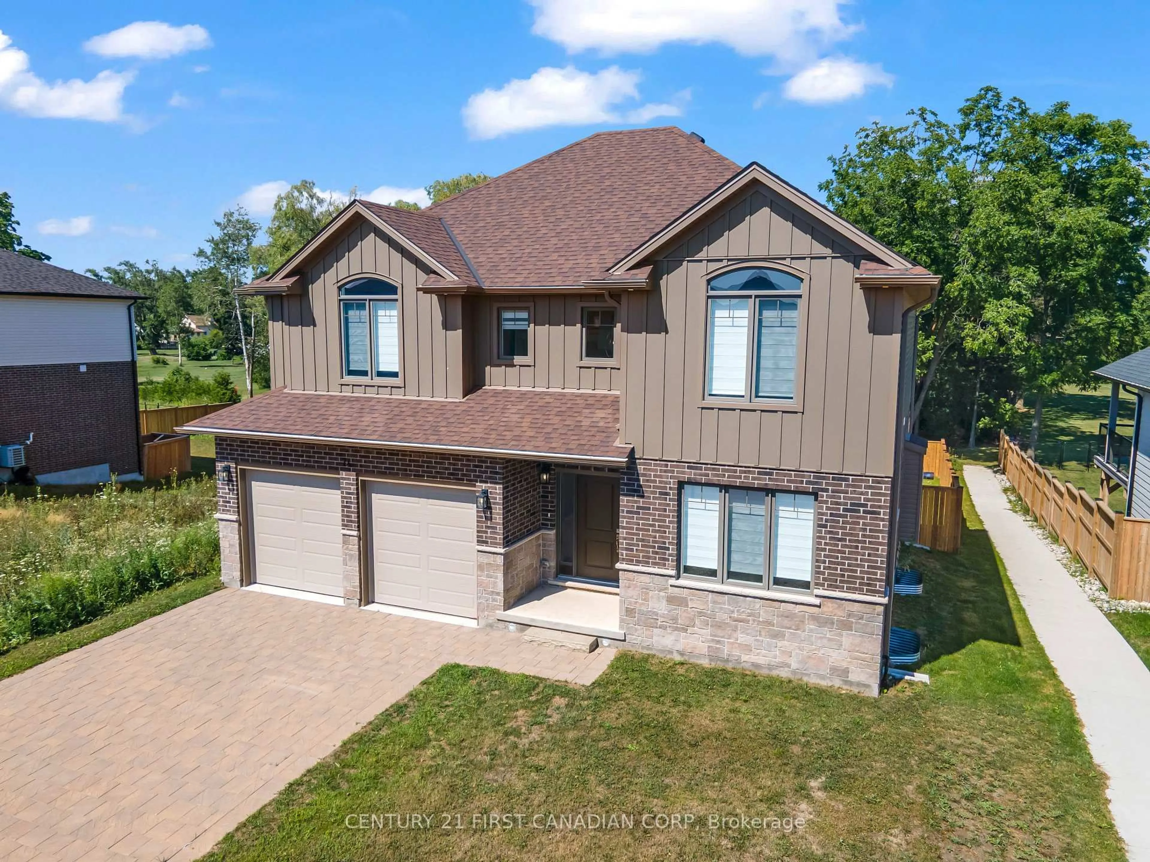 A pic from outside/outdoor area/front of a property/back of a property/a pic from drone, street for 74 Royal Cres, Southwold Ontario N5P 3T2