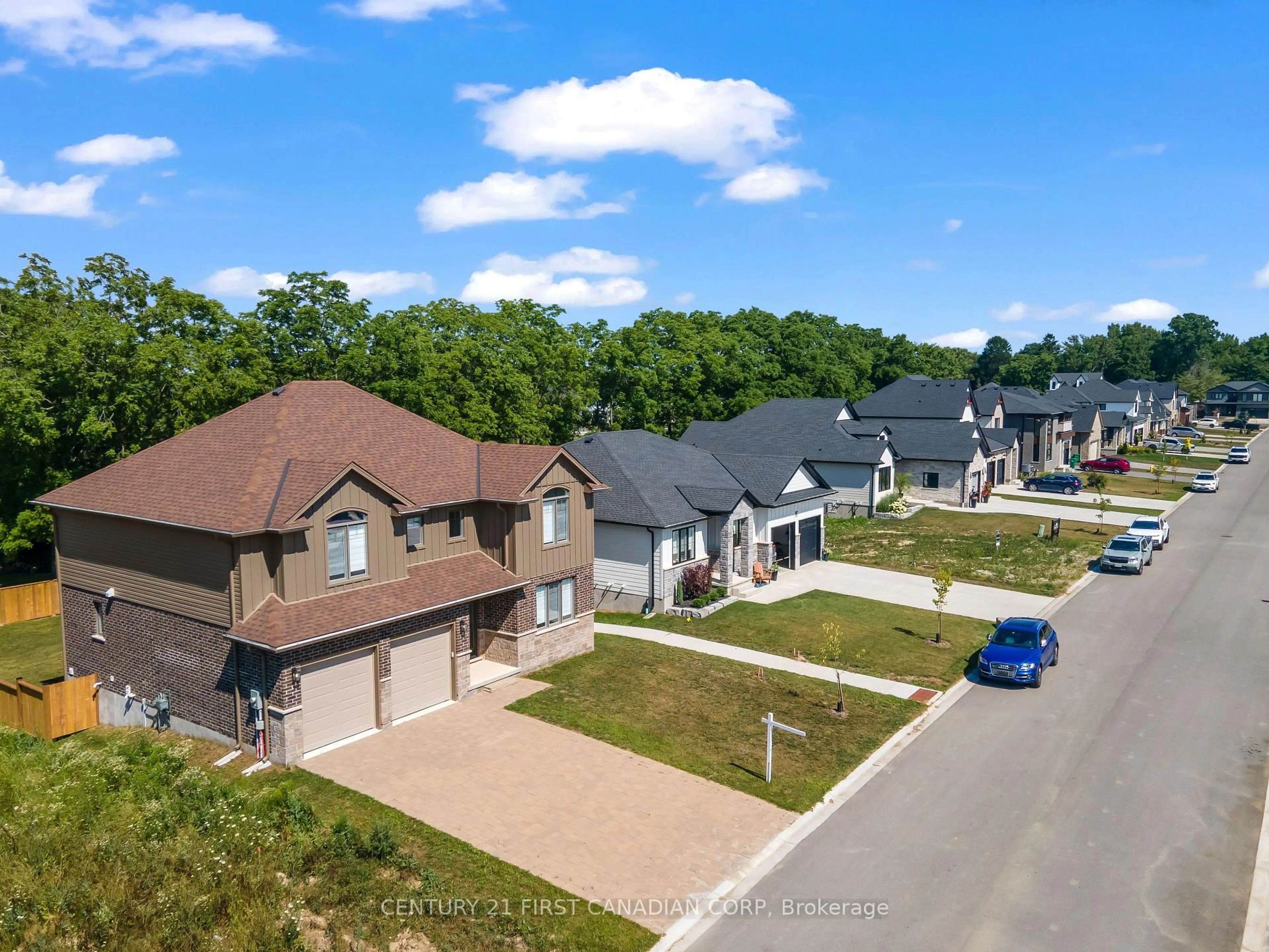 A pic from outside/outdoor area/front of a property/back of a property/a pic from drone, street for 74 Royal Cres, Southwold Ontario N5P 3T2