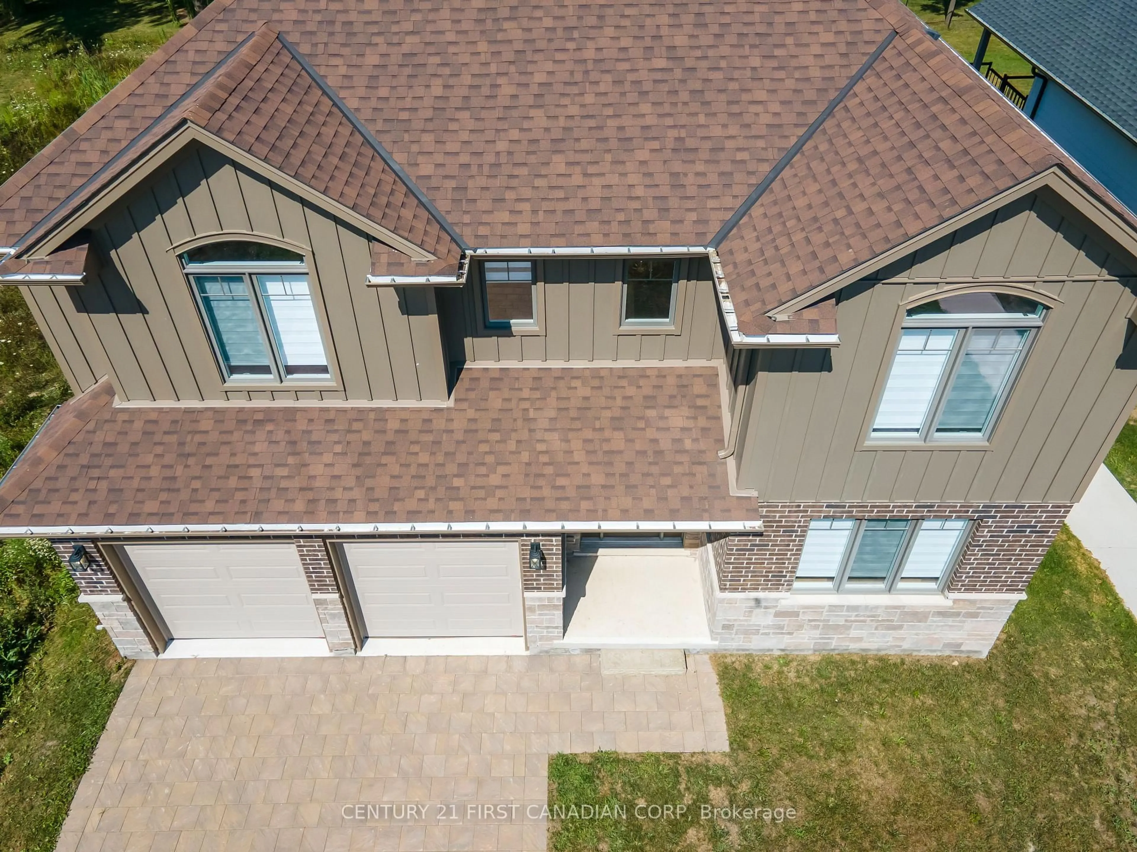 A pic from outside/outdoor area/front of a property/back of a property/a pic from drone, street for 74 Royal Cres, Southwold Ontario N5P 3T2