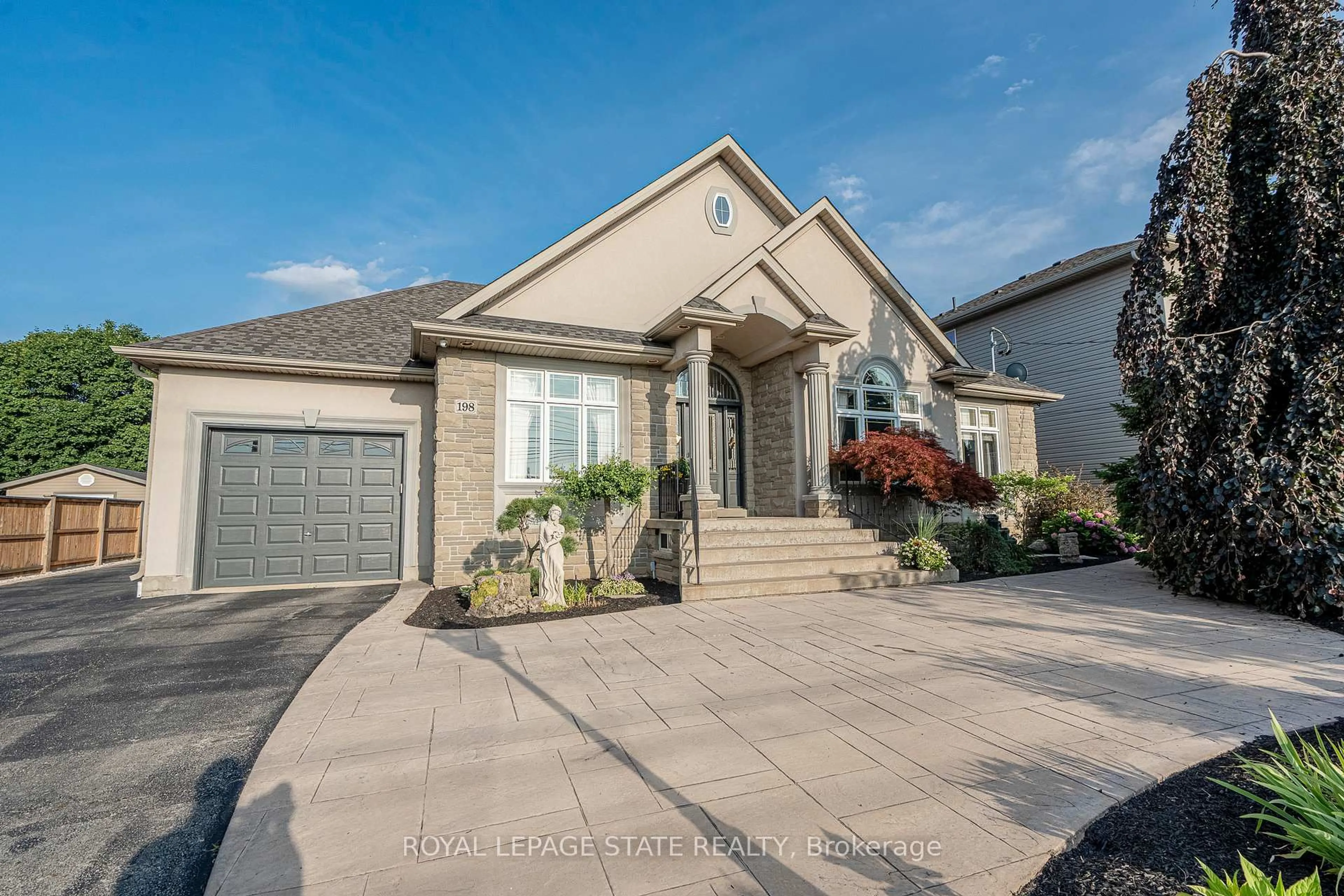 Home with brick exterior material, street for 198 Gray Rd, Hamilton Ontario L8E 1T7