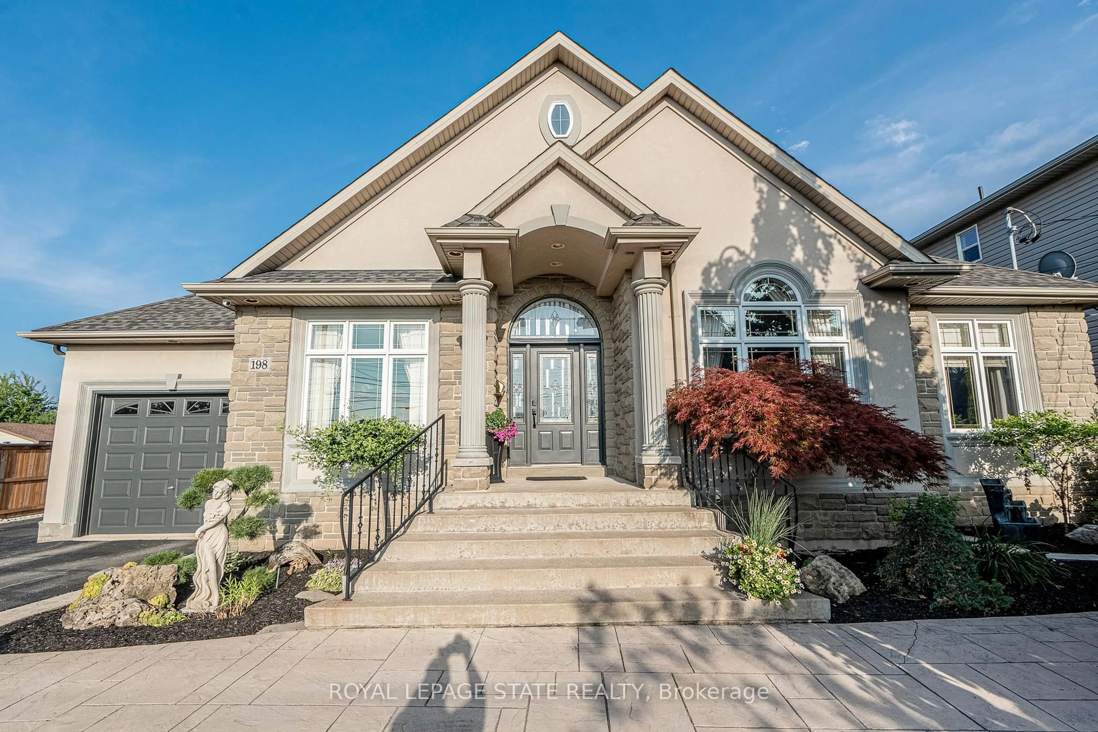 Home with brick exterior material, street for 198 Gray Rd, Hamilton Ontario L8E 1T7