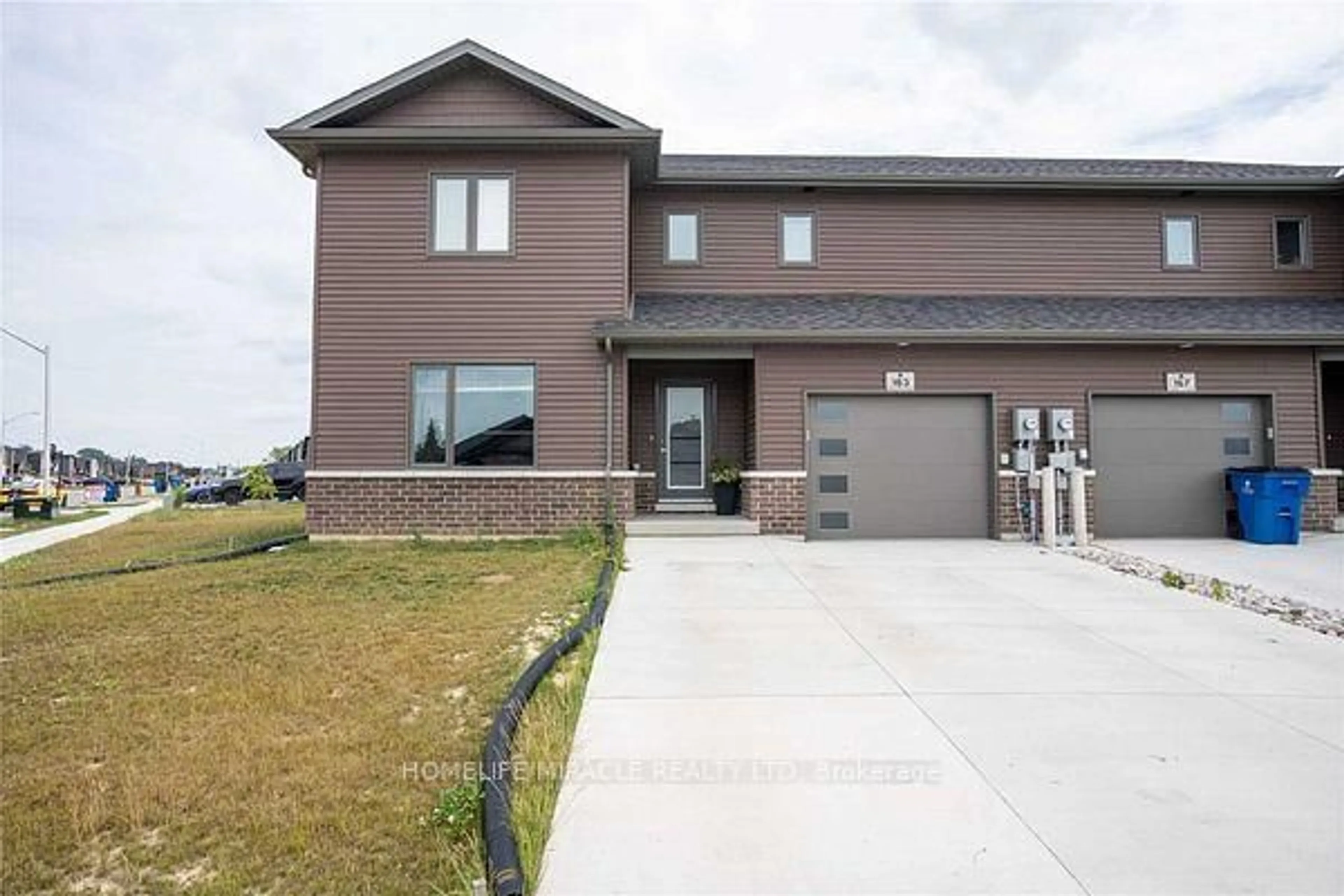 Home with brick exterior material, street for 163 Moonstone Cres, Chatham-Kent Ontario N7M 0S1