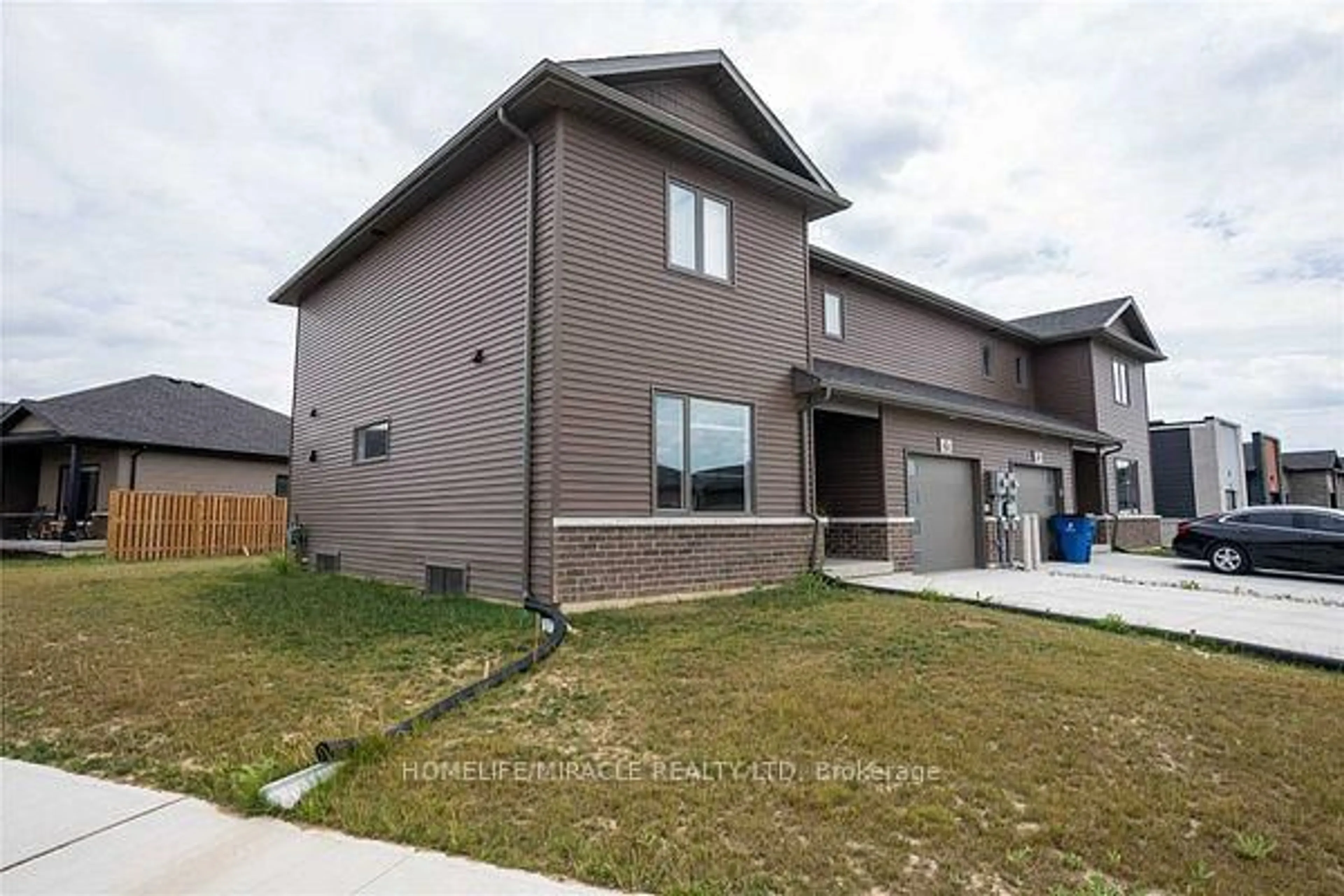 Home with brick exterior material, street for 163 Moonstone Cres, Chatham-Kent Ontario N7M 0S1